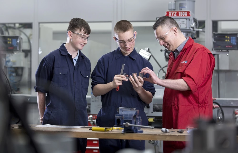 Apprentices Liam Rowden and Matthew Reilly with Gateshead College tutor Anthony Jeff