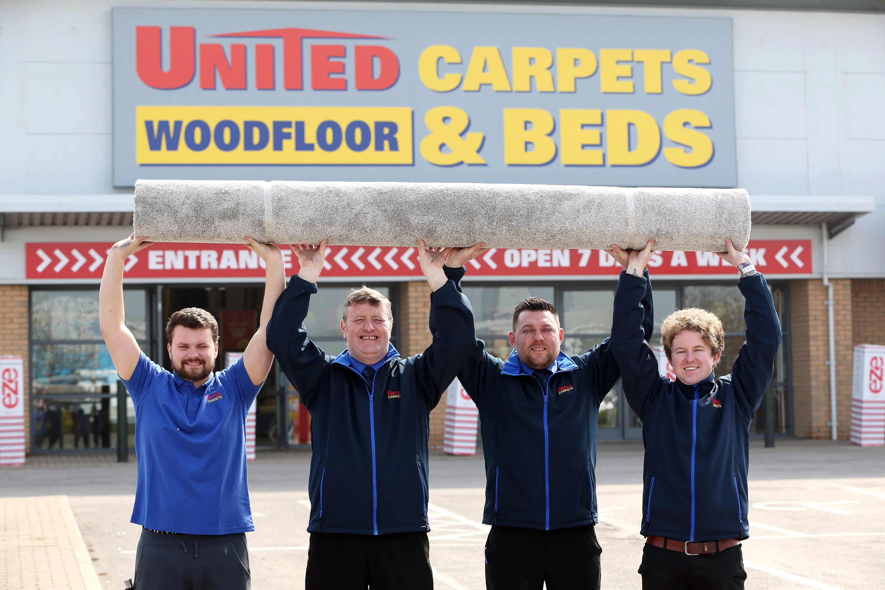 Staff outside United Carpets and Beds, Stockton-on-Tees. (L-R) Josh McCarthy, manager, Andy Grant, assistant manager, Mark Turner, Jamie Clayton