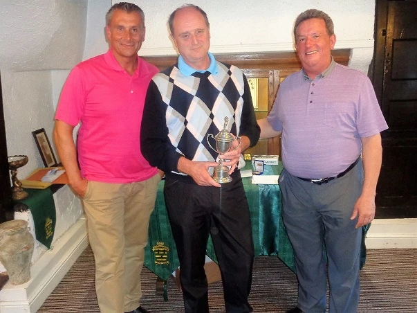 Martin-Brooks directors, Dale Wright (left) and John Elmore (right) with the winner of the firm's 2017 charity golf day, David Foxcroft of English Heritage. 