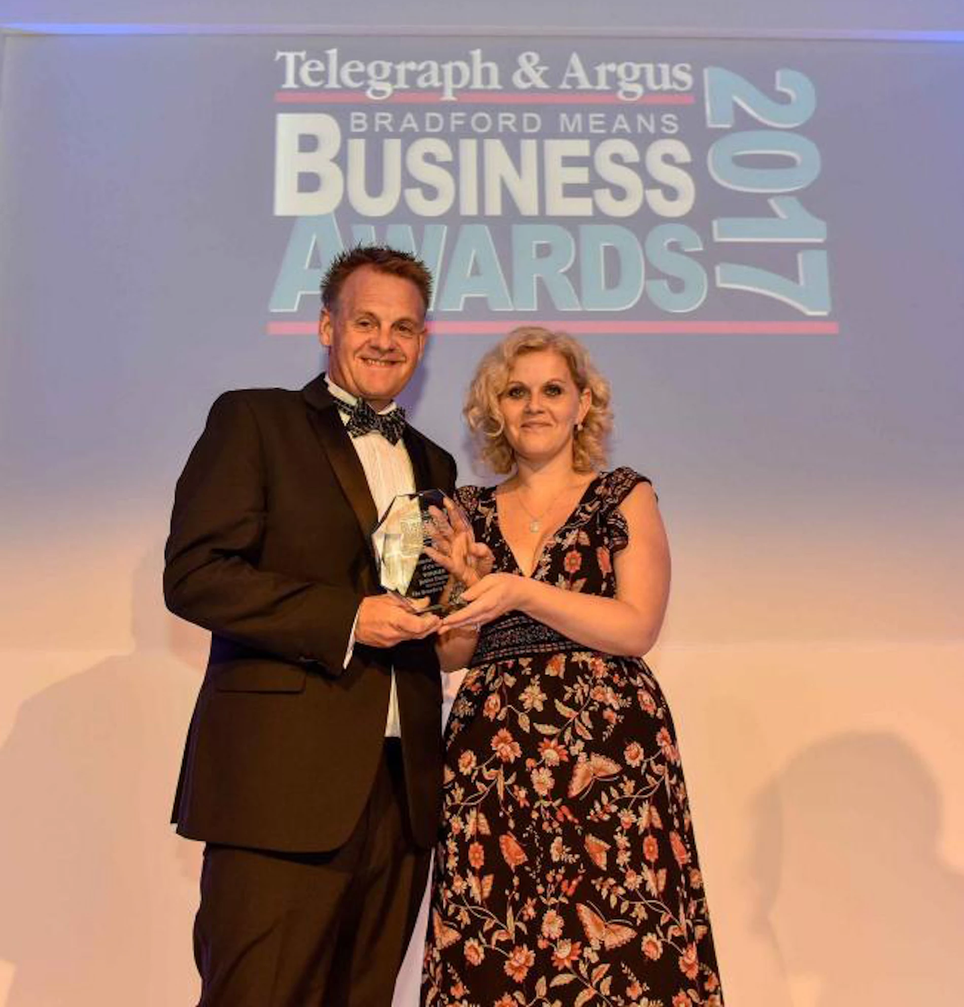 Janine picking up her Business Woman of the Year award at the Bradford Means Business awards.