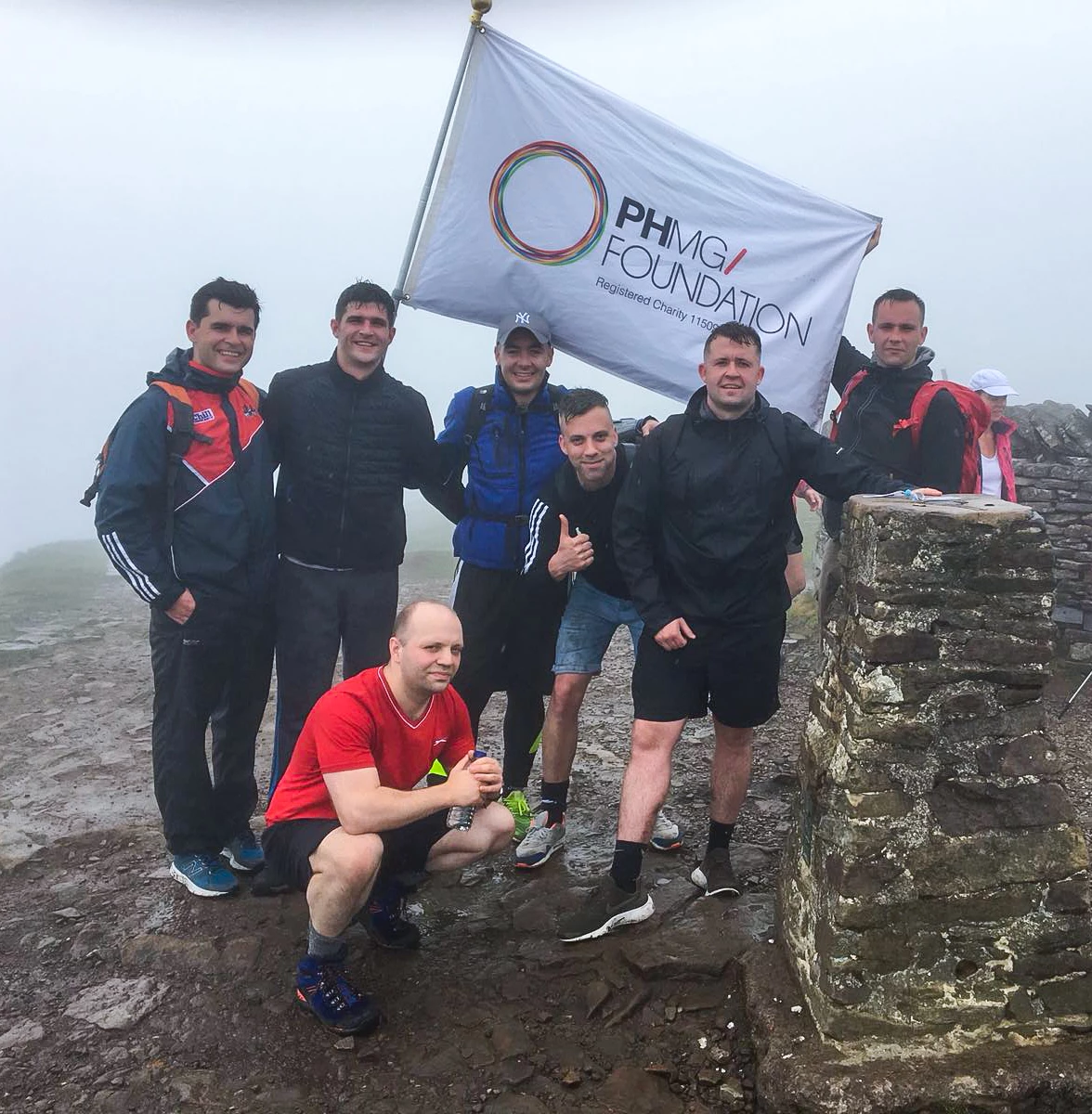 PHMG employees doing the Three Peaks Challenge