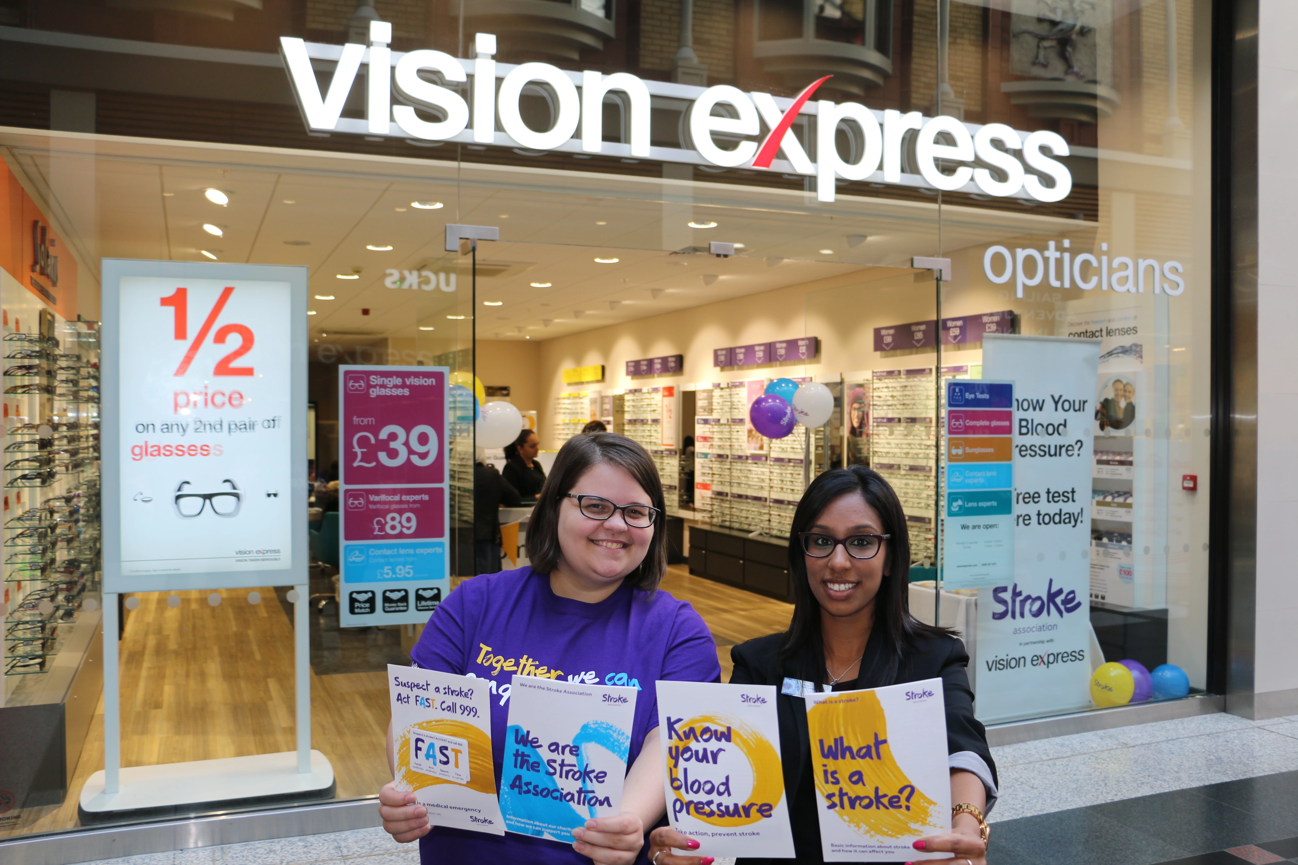 Stroke Association representative Juliana Oliver with Vision Express optical assistant Hasina Shah