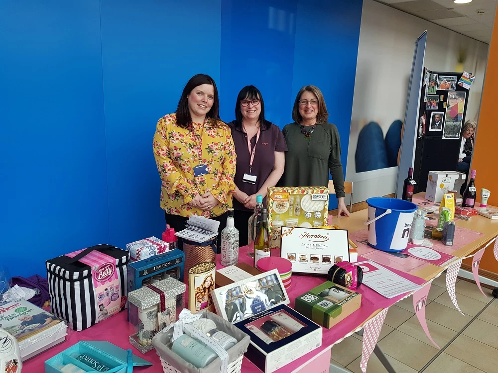 Kelly Burdis, Susie Neaber-Nessworthy and Deb Greenman hold a tombola stall 