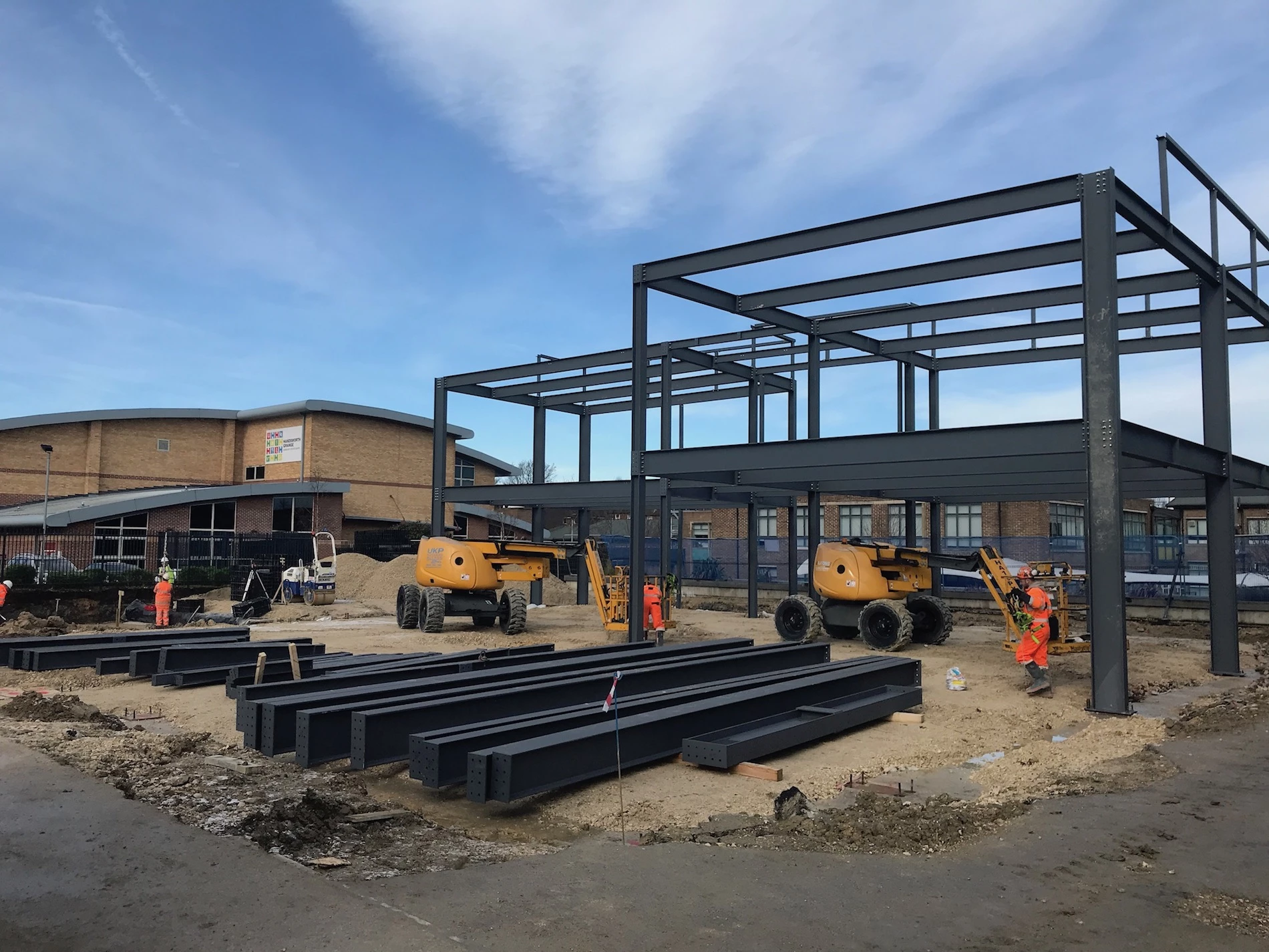 Construction of the steel frames and the progress of the new teaching block.