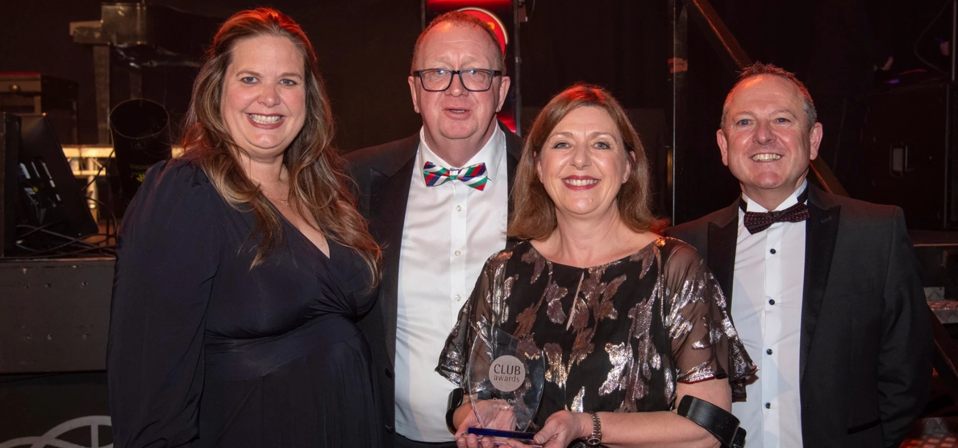 Foundation's Elizabeth Barton-Jones and Deb Hamilton collect Charity Club of the Year Award.jpg