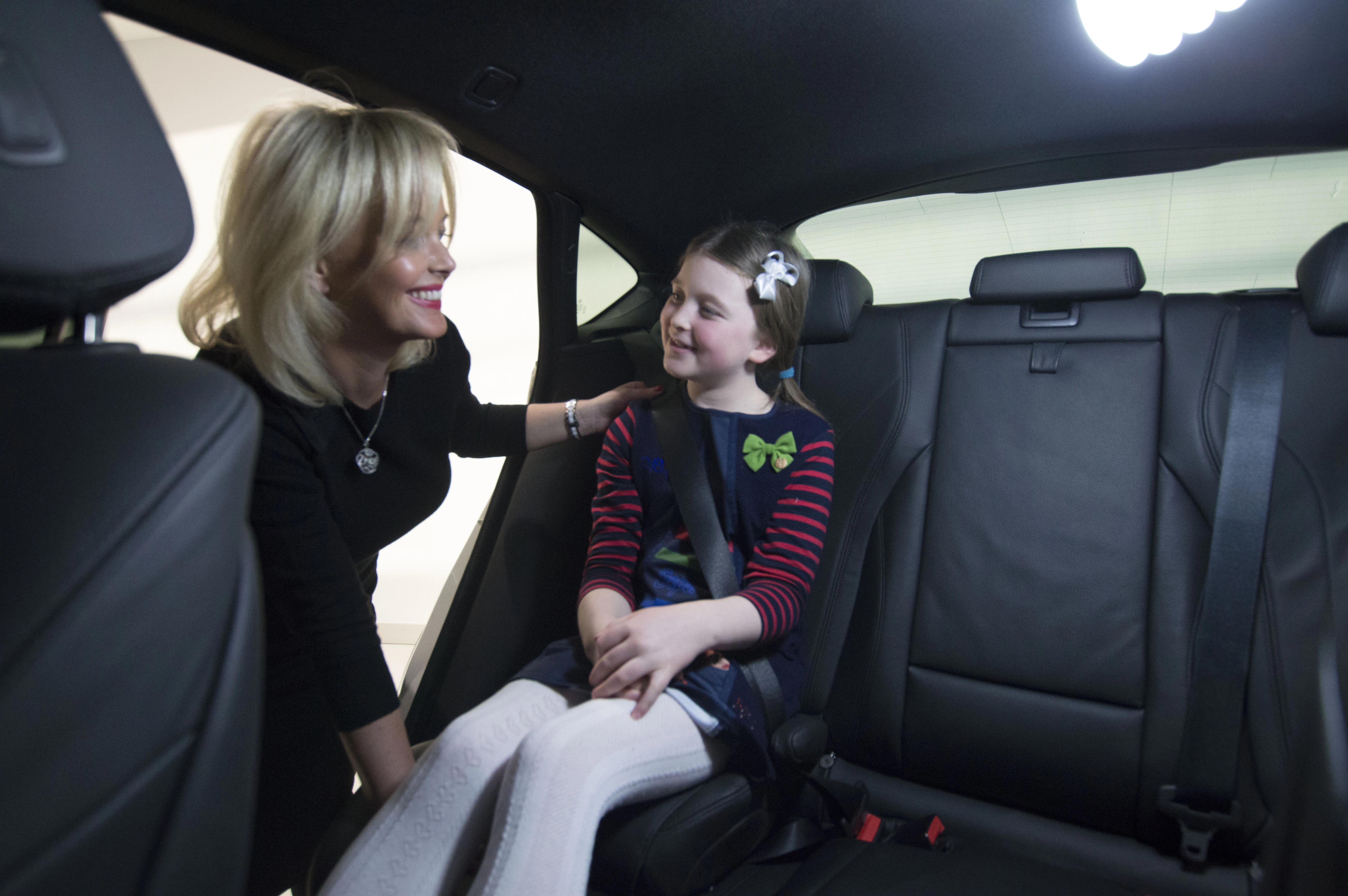 Mumpreneur Susie Wilson shows off her PLUSH luxury leather car seats for children. 