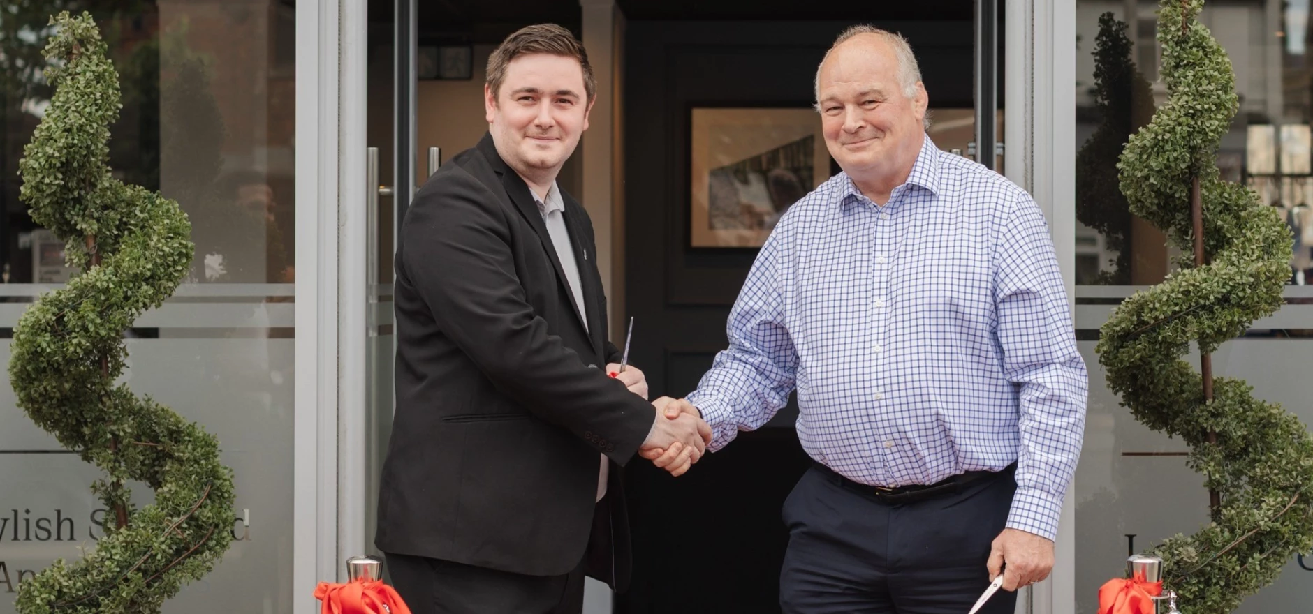 Middlesbrough Mayor Chris Cooke (left) and developer Mark Ashall open Station Suites.jpg