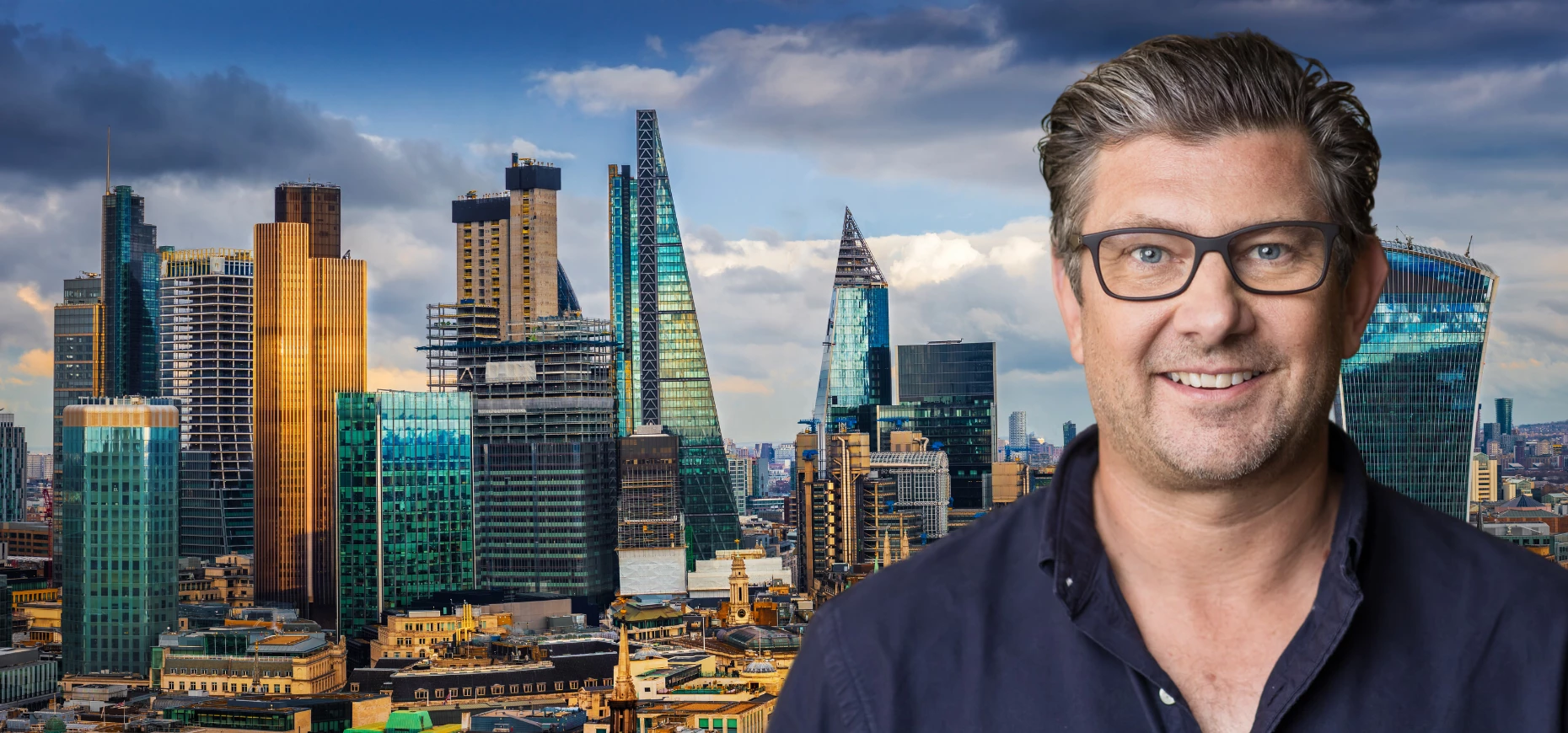Ben Thompson, CEO & Founder of Employment Hero, pictured against the London skyline.