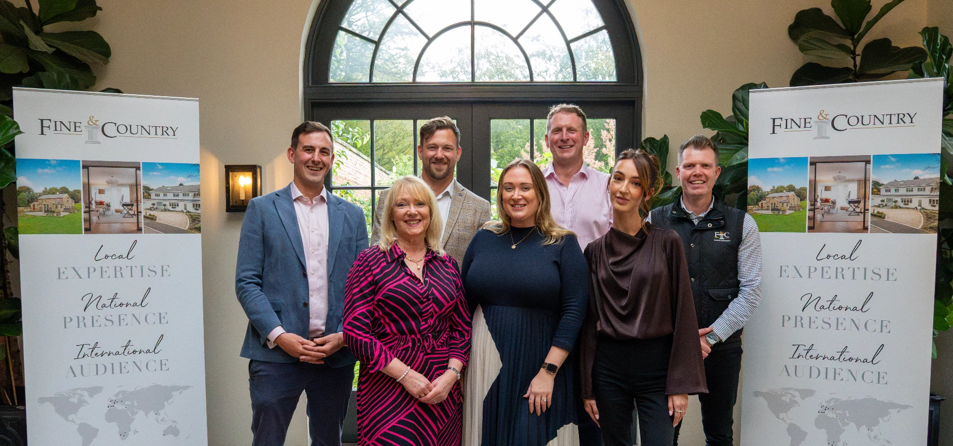 Back row L-R James and Henry Carver with Jonathan Handford MD of Fine & Country and other team members.jpg