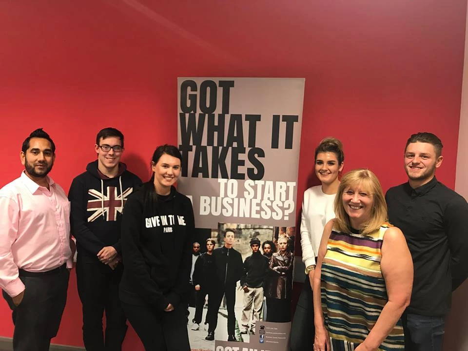 (From L-R) Monjer Rashid with Business Sparks Alex Hemmer, Bethany Wright, Ellie Dowd, Connor Watson and business adviser Gillian Middleton.