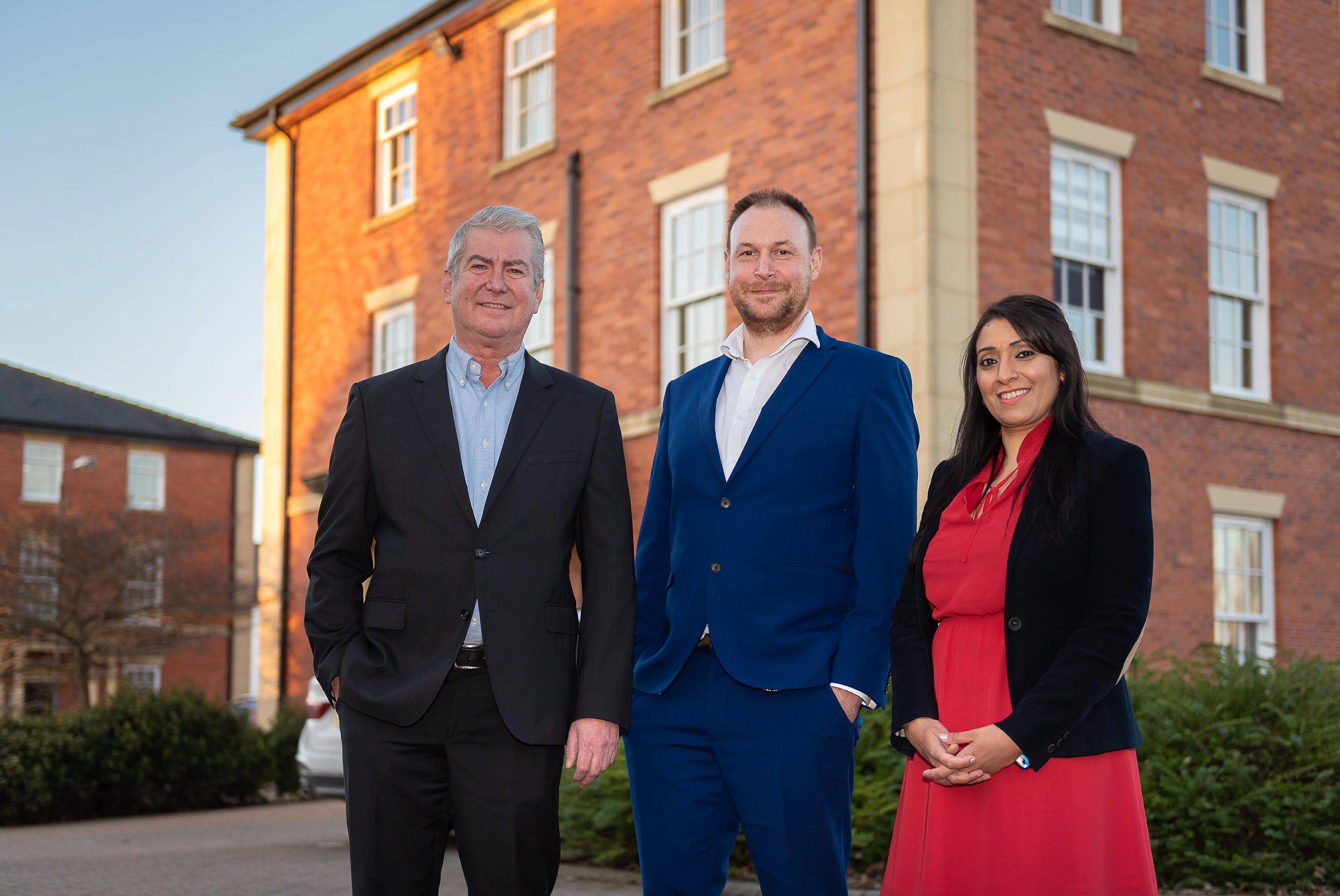 Graham Fenton (left) and Simon Lewsley (middle), directors of ICU, are pictured outside their new premises with Ann Bhatti, head of Connect Derby.