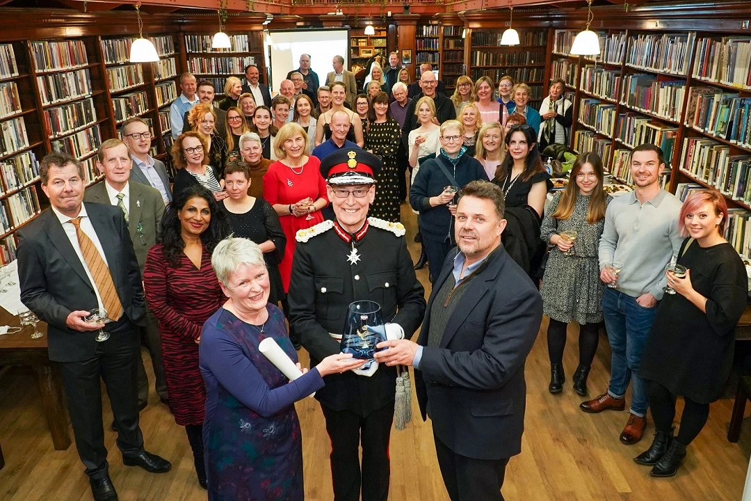 Phoenix Health and Wellbeing founder Gill Trevor and trustee David Aspland being presented with the Queen’s Award for Enterprise by Ed Anderson, Lord Lieutenant of West Yorkshire