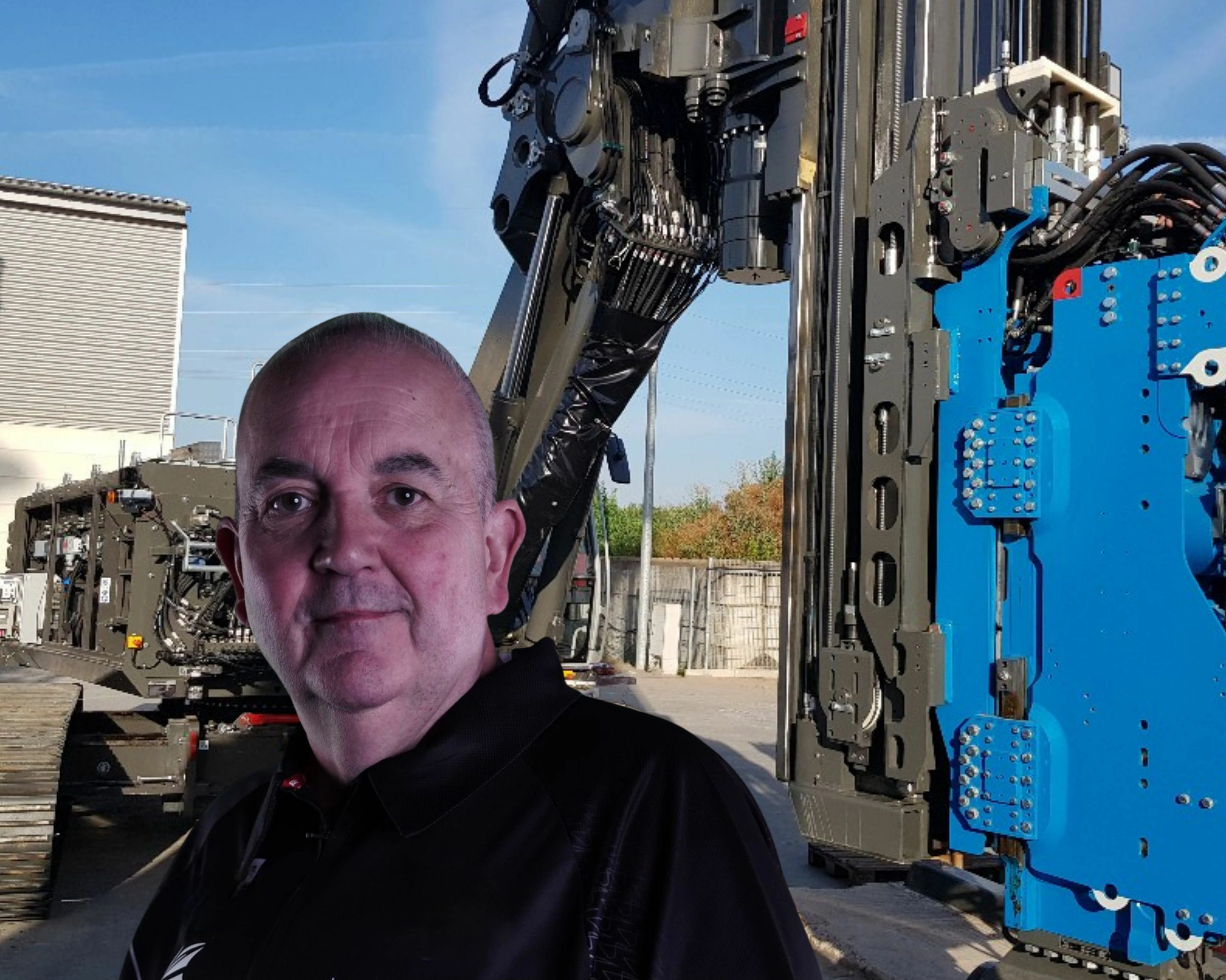 Phil (The Power) Taylor in front of one of Sheet Piling UK's unique long-reach rigs