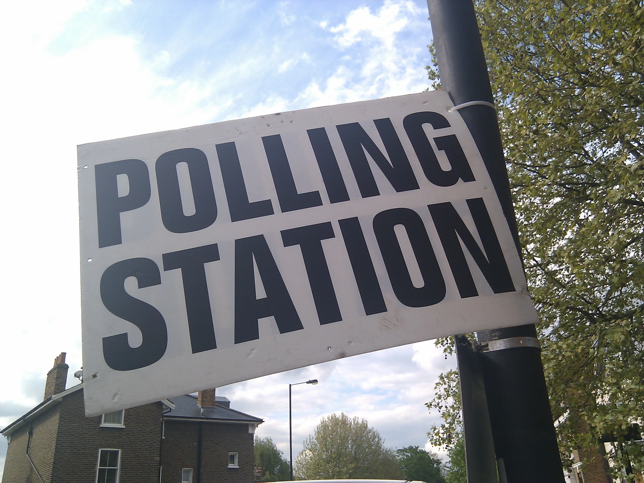 Sign for a UK polling station.