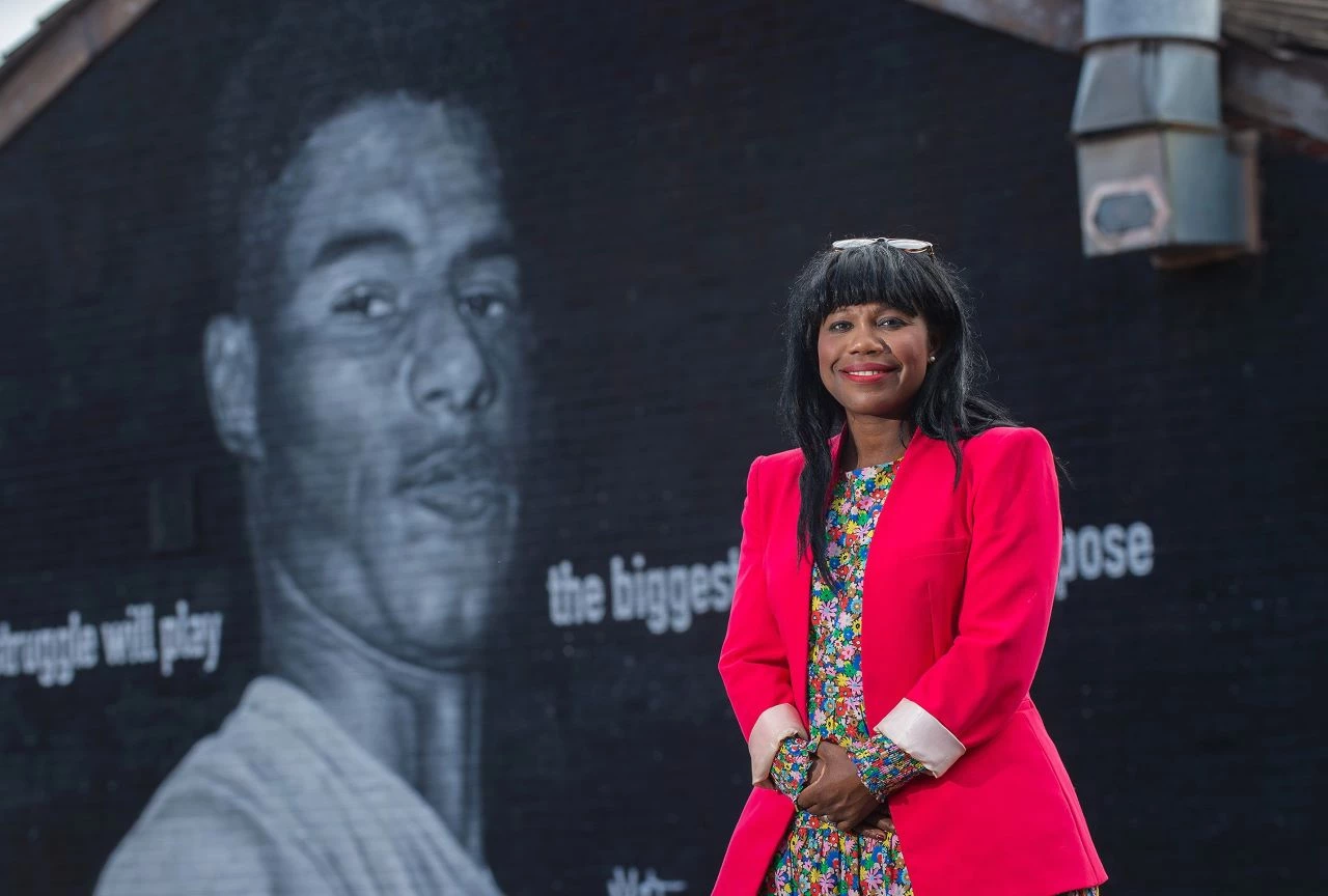 Sally Penni with the Marcus Rashford mural (courtesy of Peter Powell)