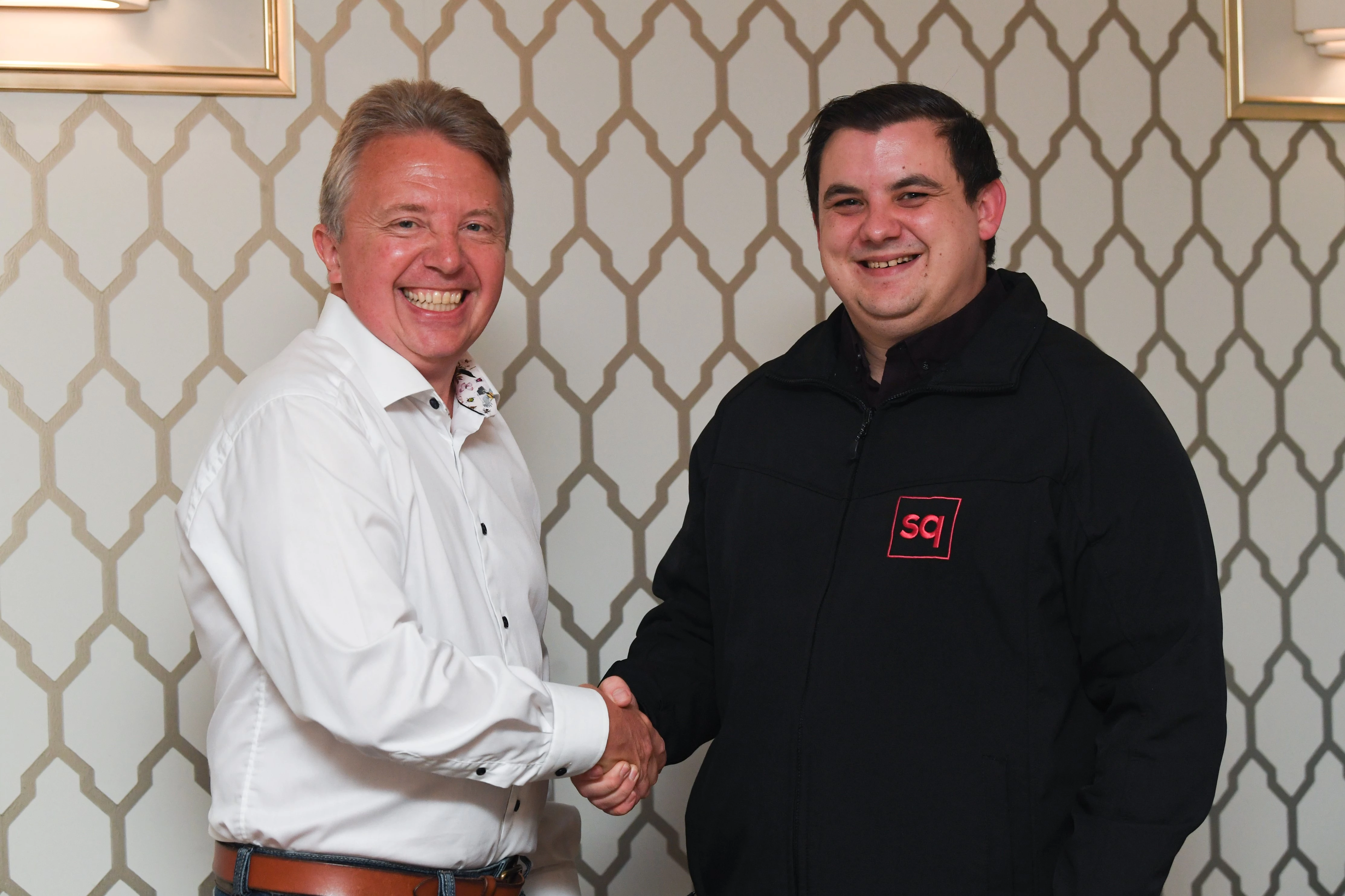 Alan Perkins of SilverDisc (left) with Matthew Rigby White of Qoob Group and Square Media (right)