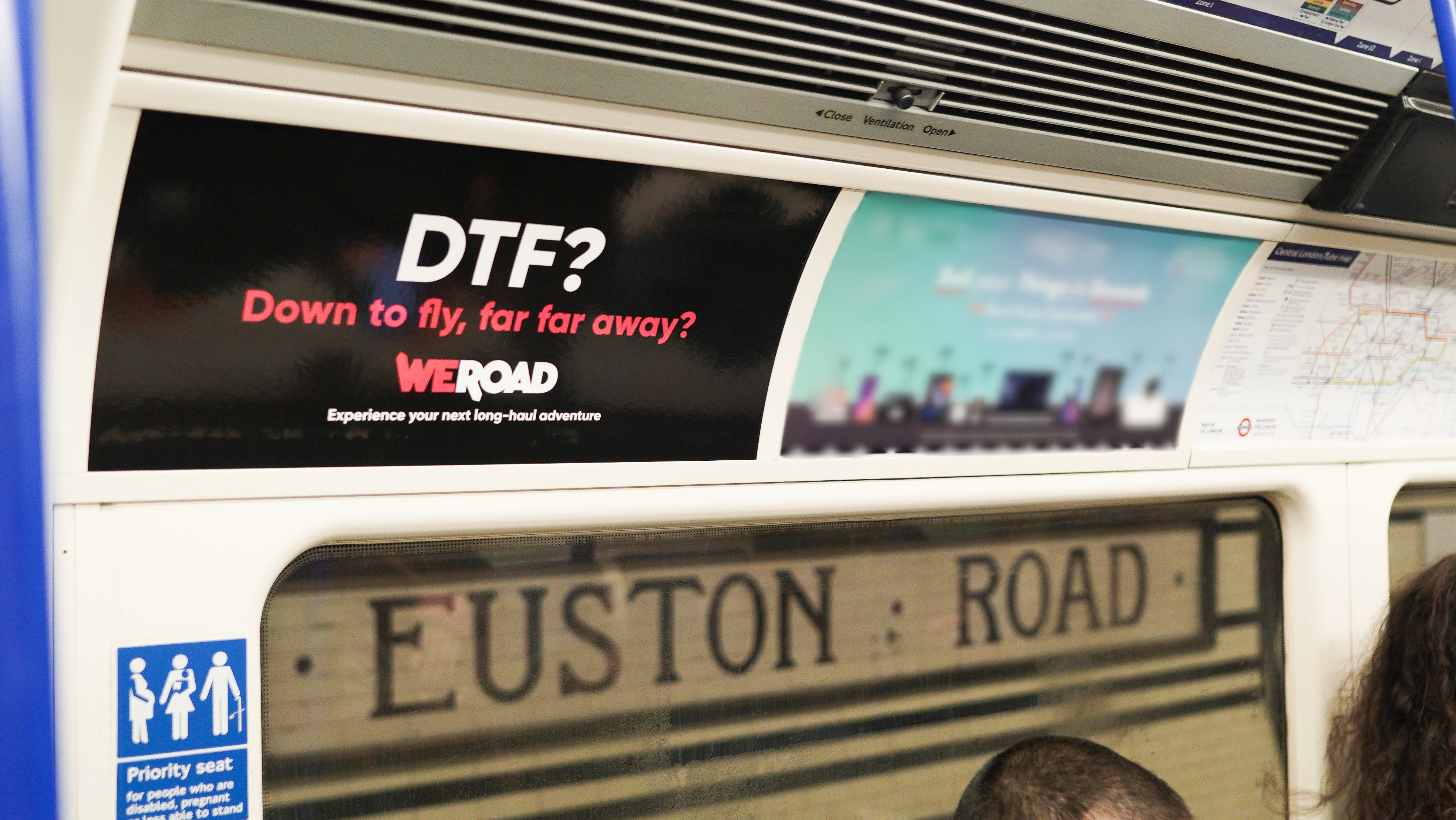 A WeRoad ad inside a tube carriage stating 'DTF? Down to fly far far away