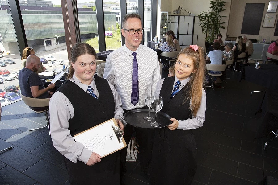 Chefs' Academy Manager Dave Simpson with students Katie Robson and Daisy Ainsworth