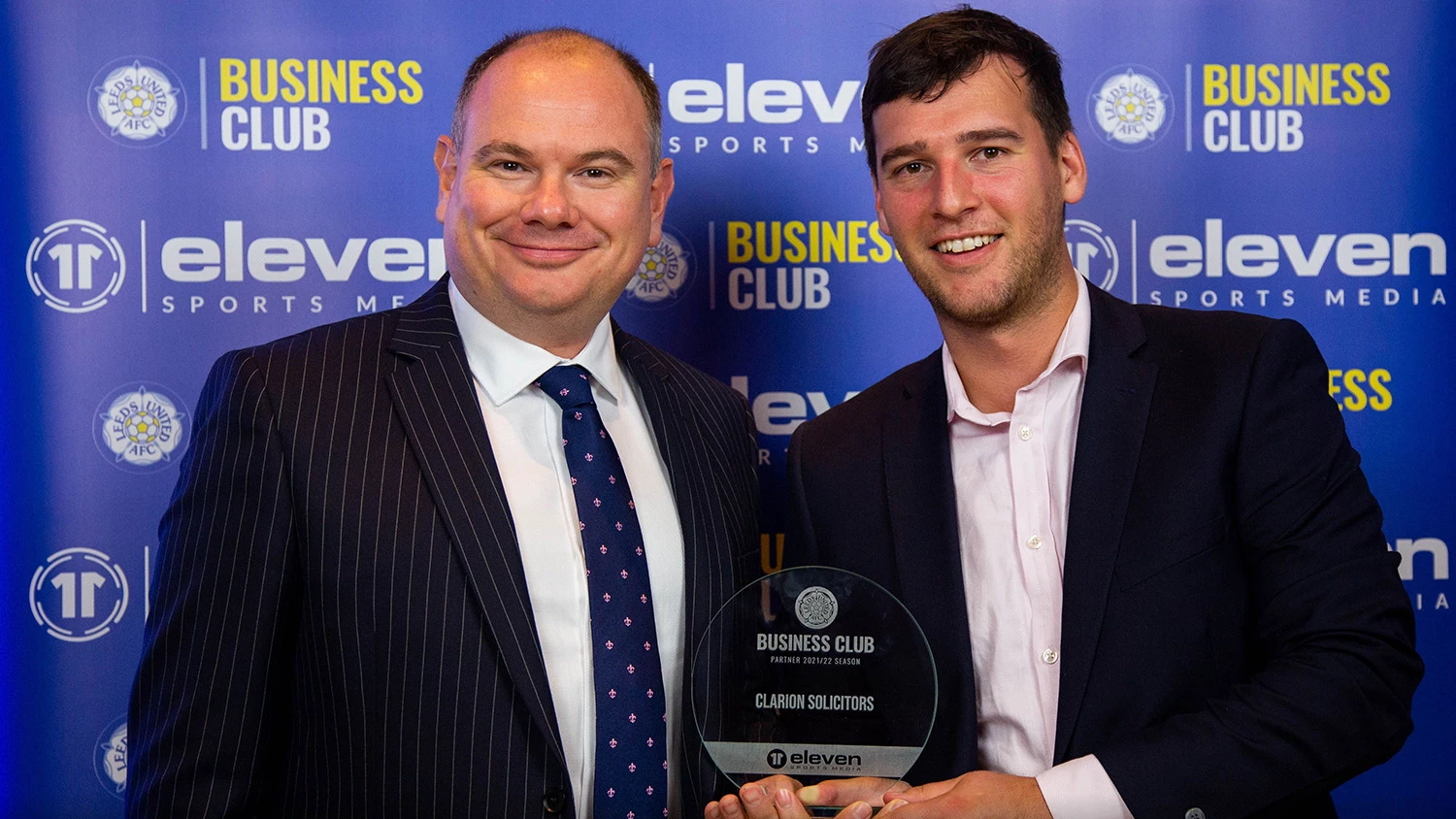 Clarion's Jonathan Simms And Andrew Curtis Celebrating The Company's Leeds United Business Club Partnership