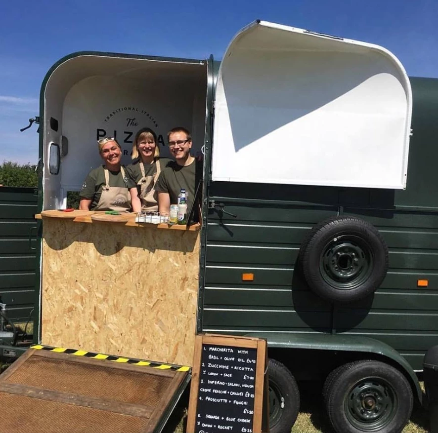 Head Chef, Oliver Ellis, with his crew and horsebox. 