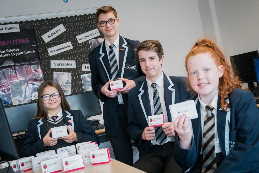 Payment card provider Suresite donates computers to local Preston students