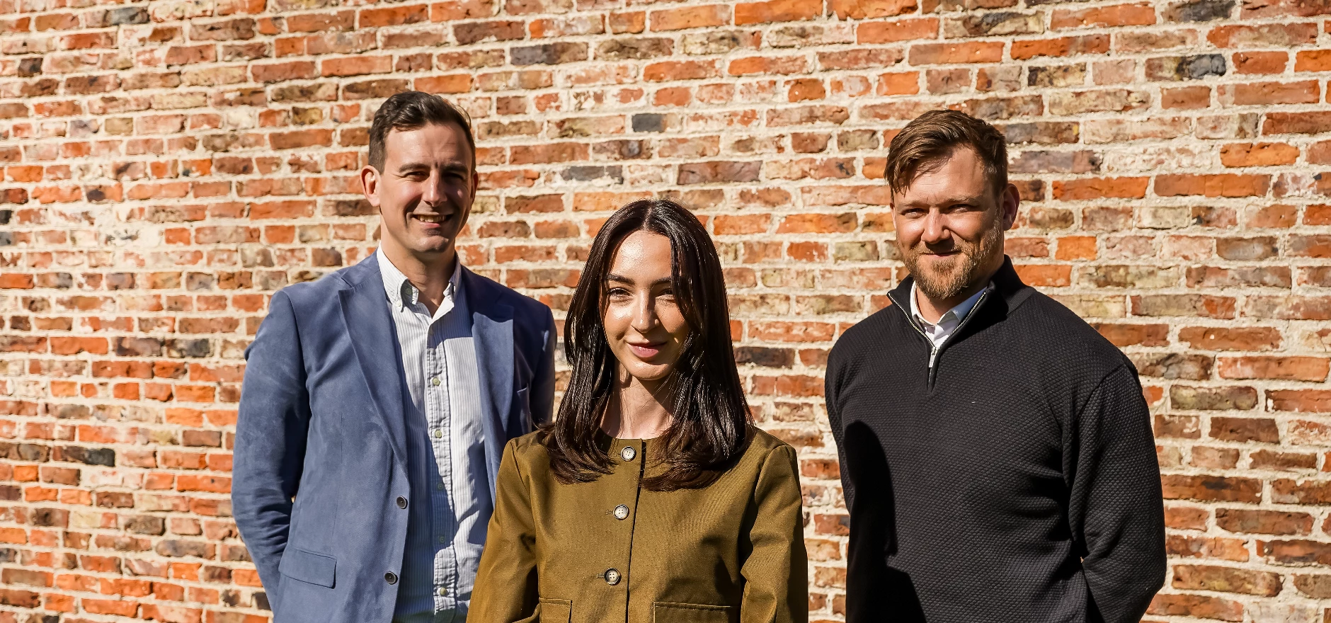 Directors James and Henry Carver with Grace Wilkinson.jpg