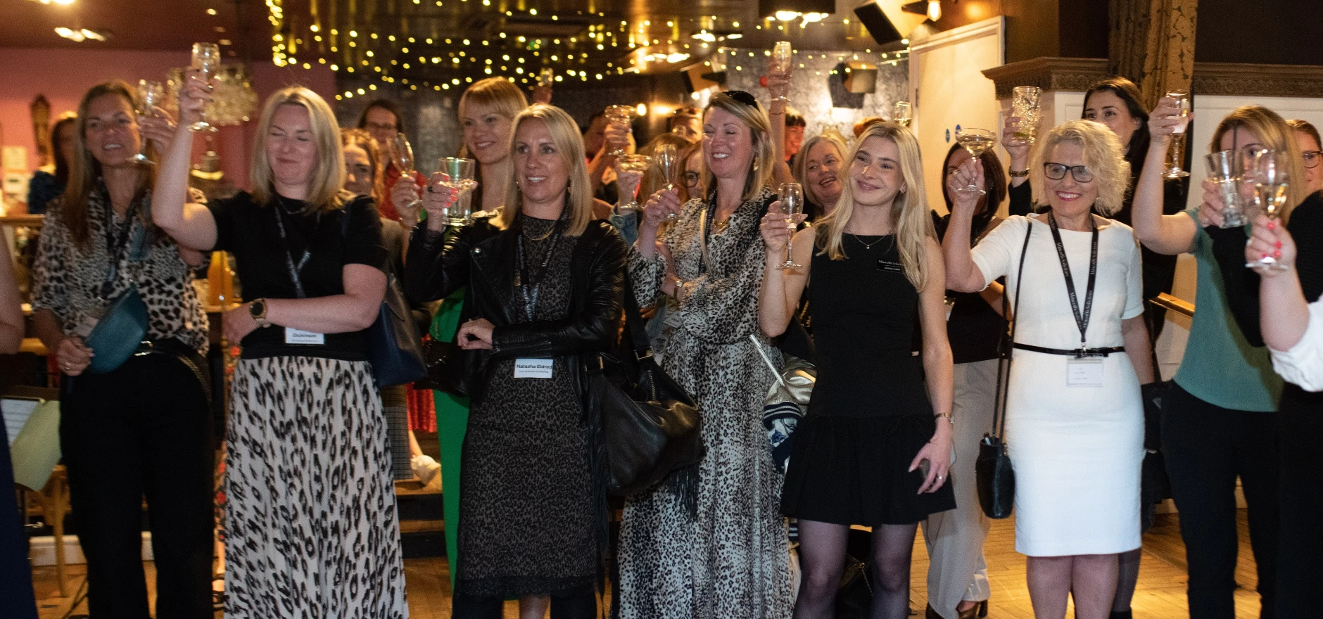 Guests raising a toast at Fizz in the City.jpg