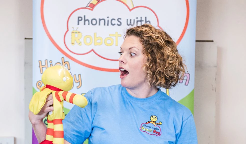 Debra Proud of Phonics with Robot Reg Sutton Coldfield