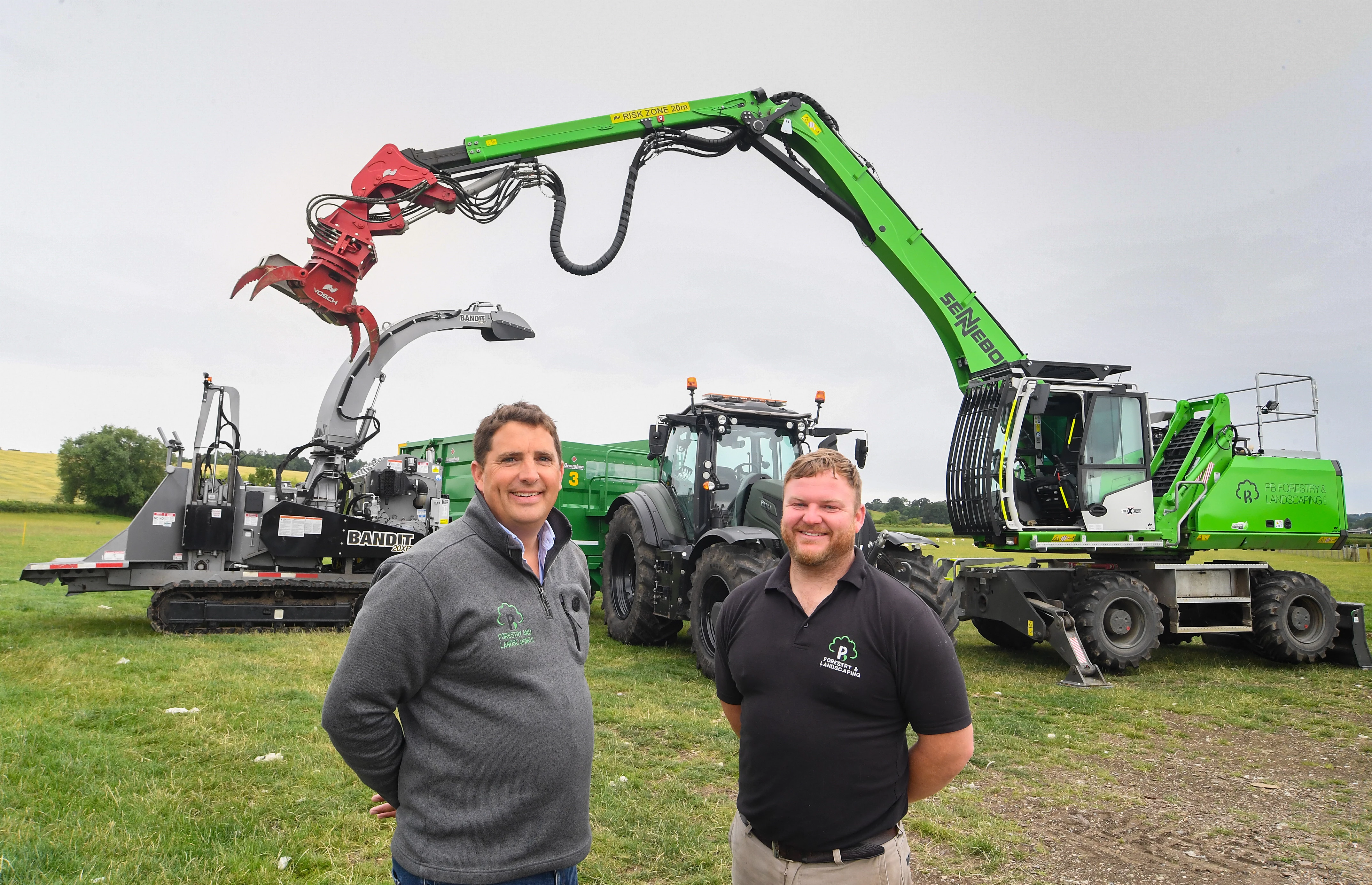 PB Forestry and Landscaping Managing Director Philip Bett with Senior Operative Terry Boneham and the new machinery.