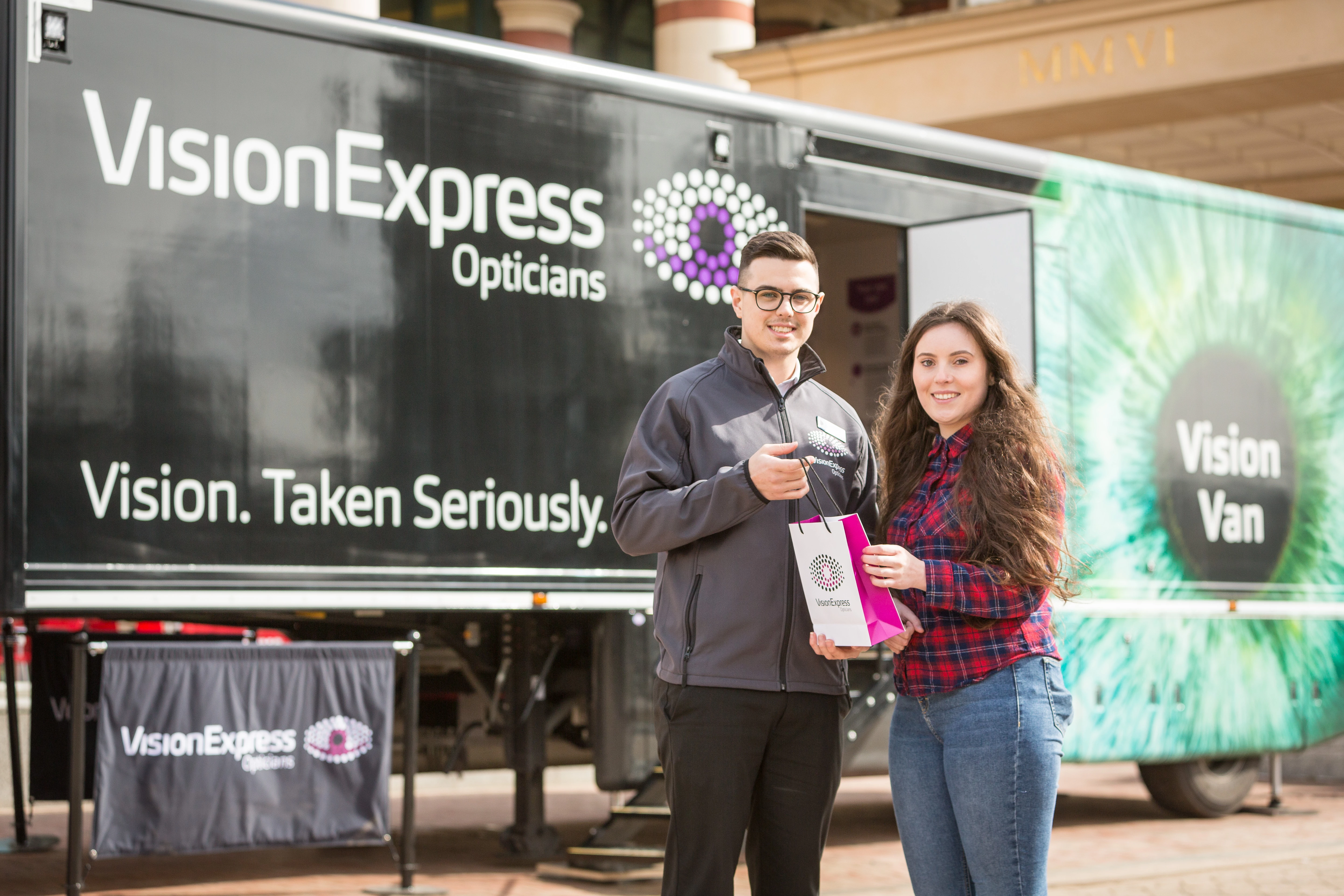 The Vision Van at intu Trafford Centre in Manchester. L-R: Vision Express optical assistant Owen Bairstow and visitor Jay Anderson.
