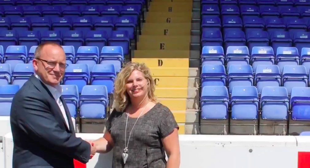 Chester FC chief exec Mark Maguire with Red Insure's Janine Revill