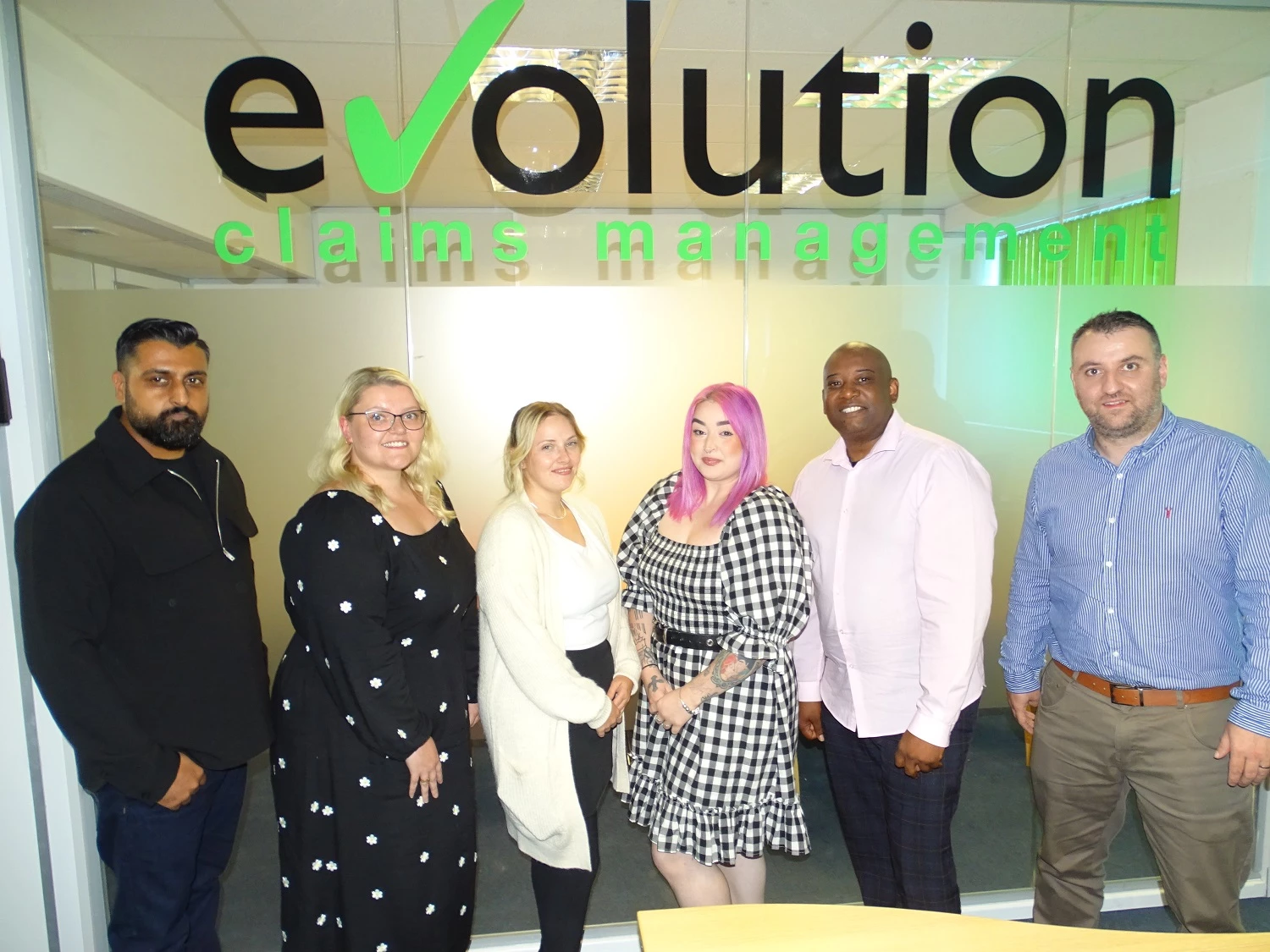 Evolution colleagues, from left, Sunny Bhandari, George Cooper, Charlotte Dovey, Stacey Bott, Tom Browne and Chief Operating Officer Martin Thompson