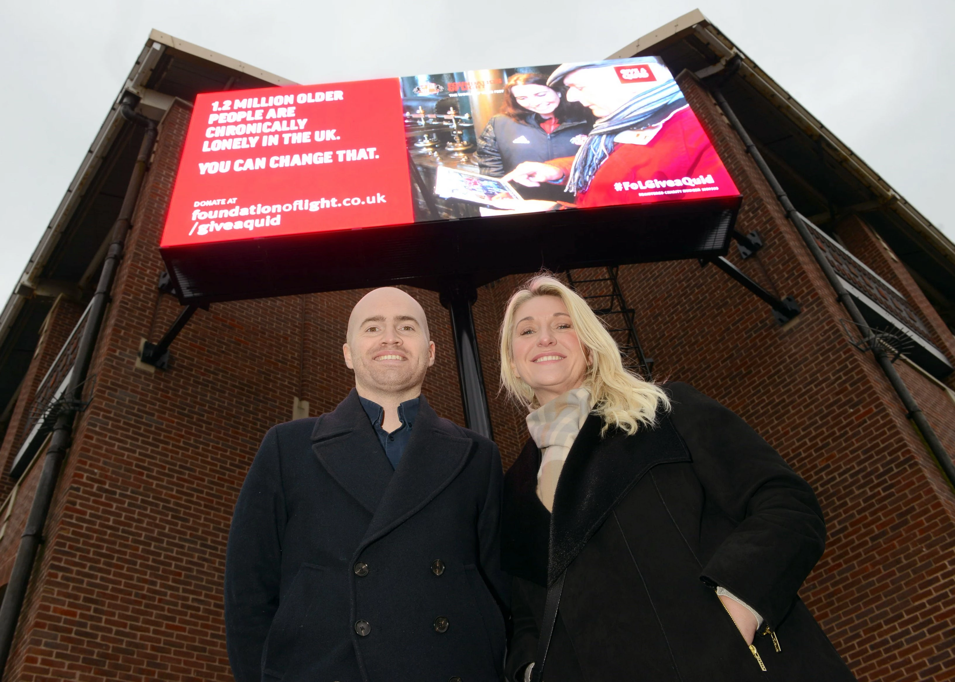 Smart Outdoor Operations Director Tricia Shannon (R) unveils Foundation of Lights advertising with Foundation of Light Commercial Director, Phil King