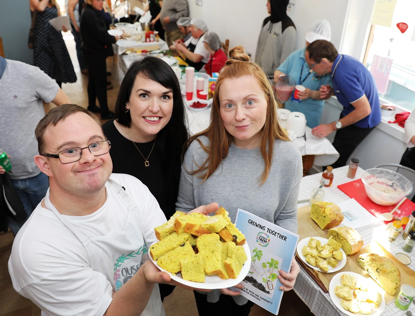 Baker and volunteer Adam Tait, Beth Hazon, Chair of Ouseburn Farm Charity and Sarah Melling, Marketing Manager at Ringtons
