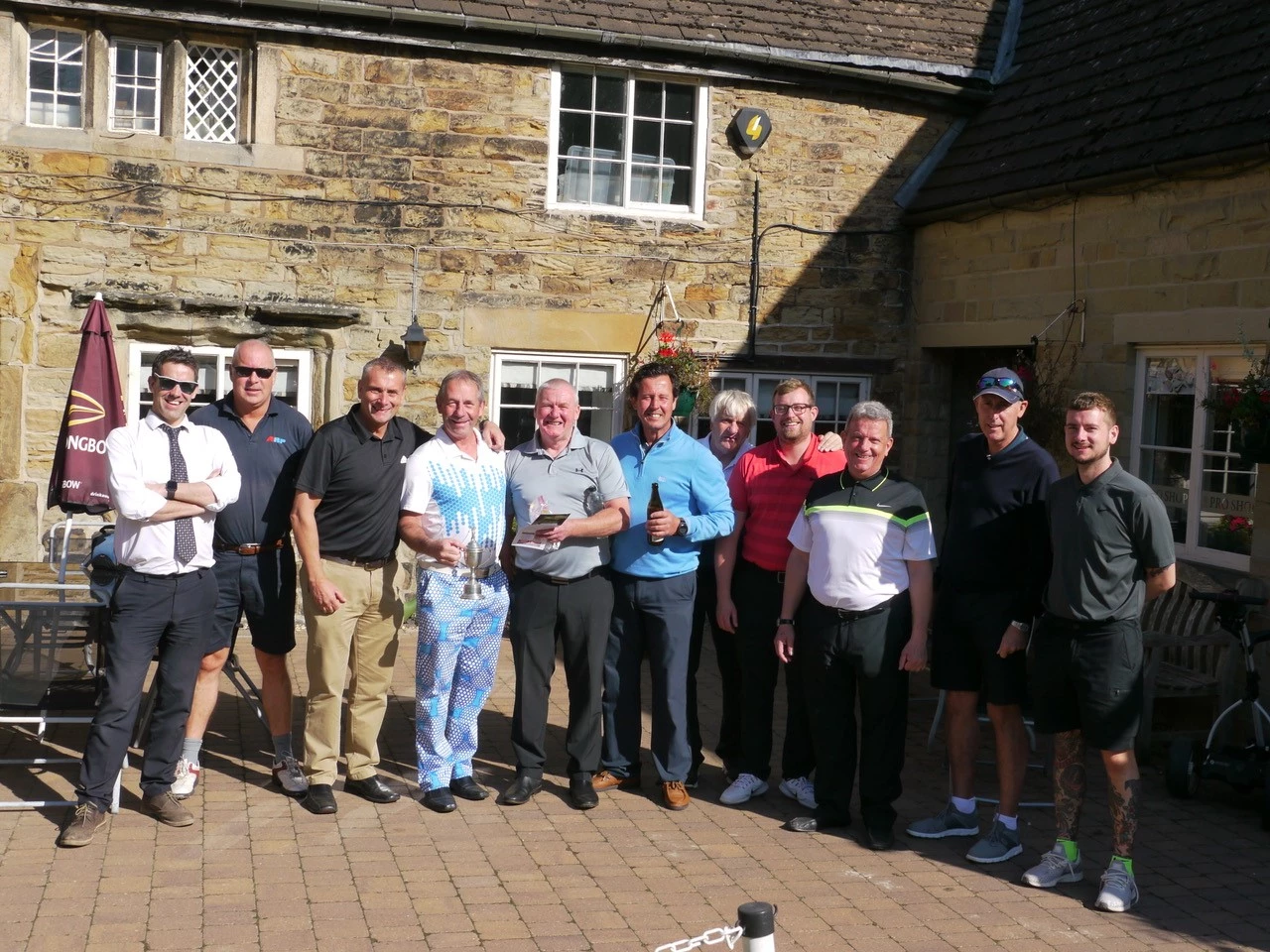 Martin-Brooks' contracts director, Dale Wright (third left), with some of the participants at the firm's latest charity golf day. 