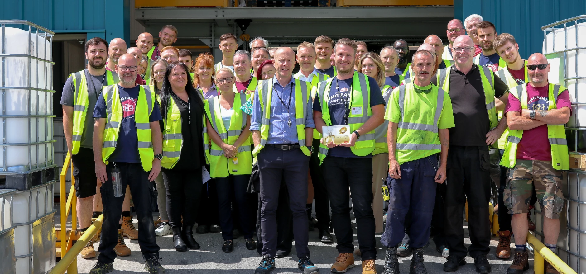 HMG Paints all staff Manufacturing Family Business of the Year 2023.jpg