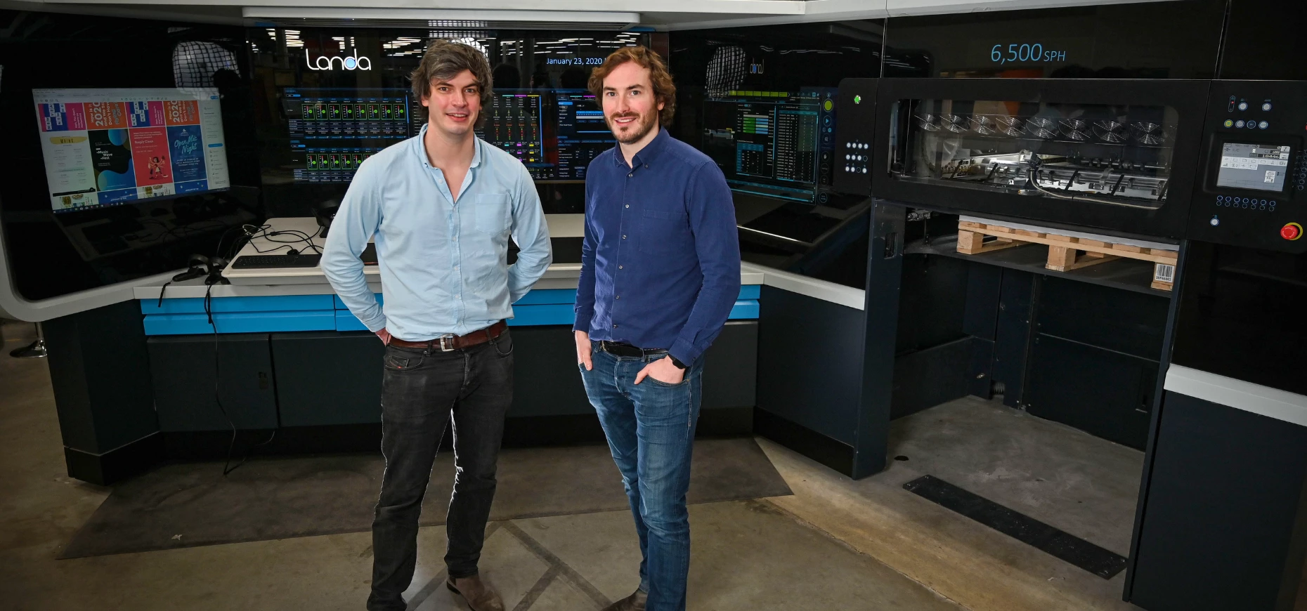 instantprint founders James Kinsella and Adam Carnell pictured with instantprint’s first Landa Press.