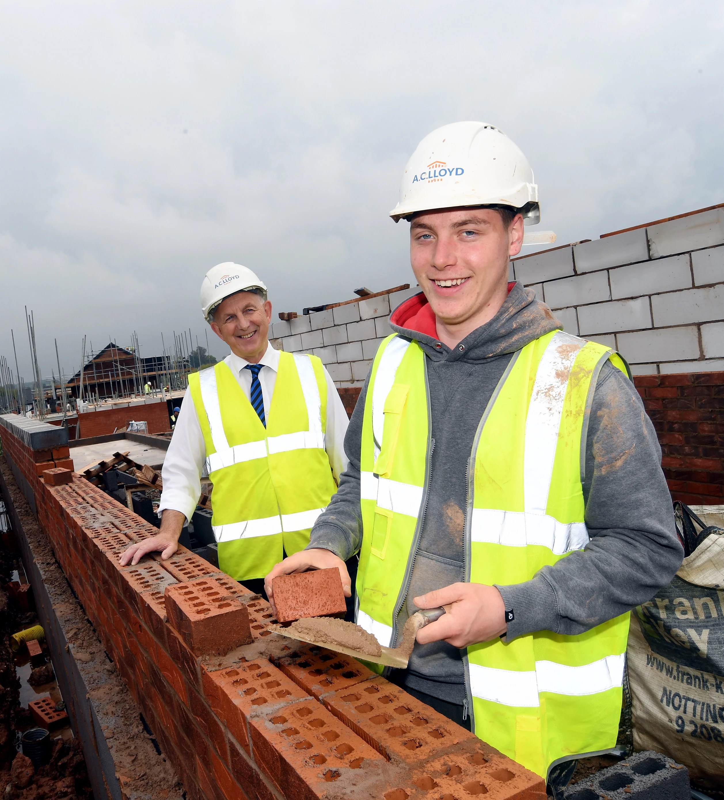 Apprentice Billy Wyllie (front) with Steve Essex from AC Lloyd at Chesterton Gardens in Leamington