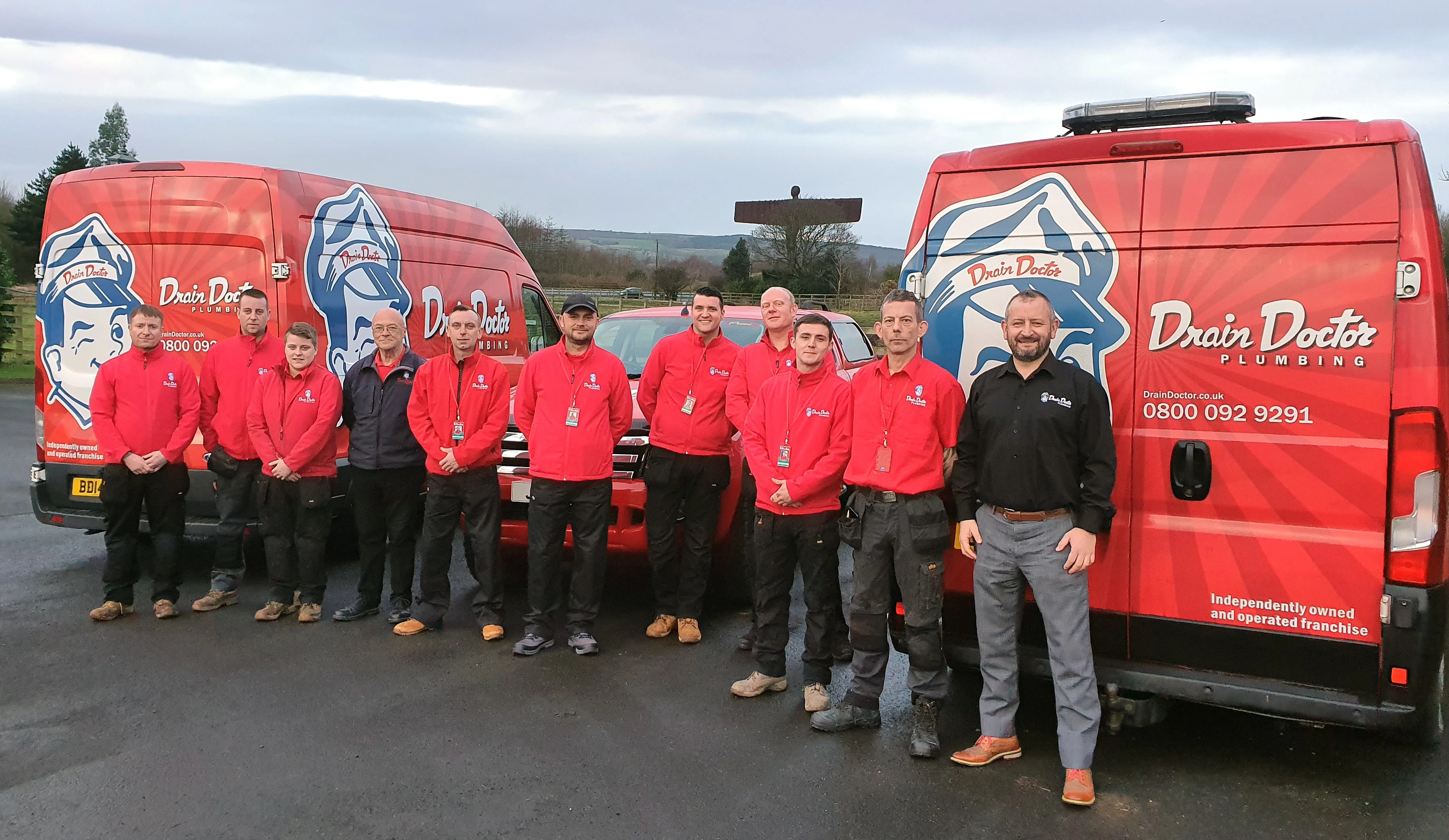 Jim Watson (on the right), Drain Doctor franchise owner, with his team of technicians.