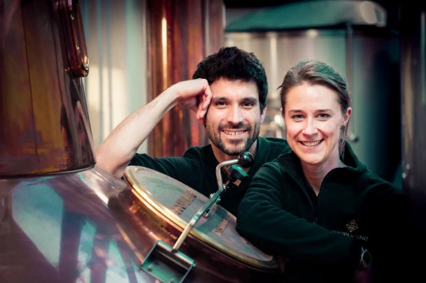 Abbie & Chris, owners of Cooper King Distillery with their new Copper Pot Still funded through a £18,000 PAPI grant