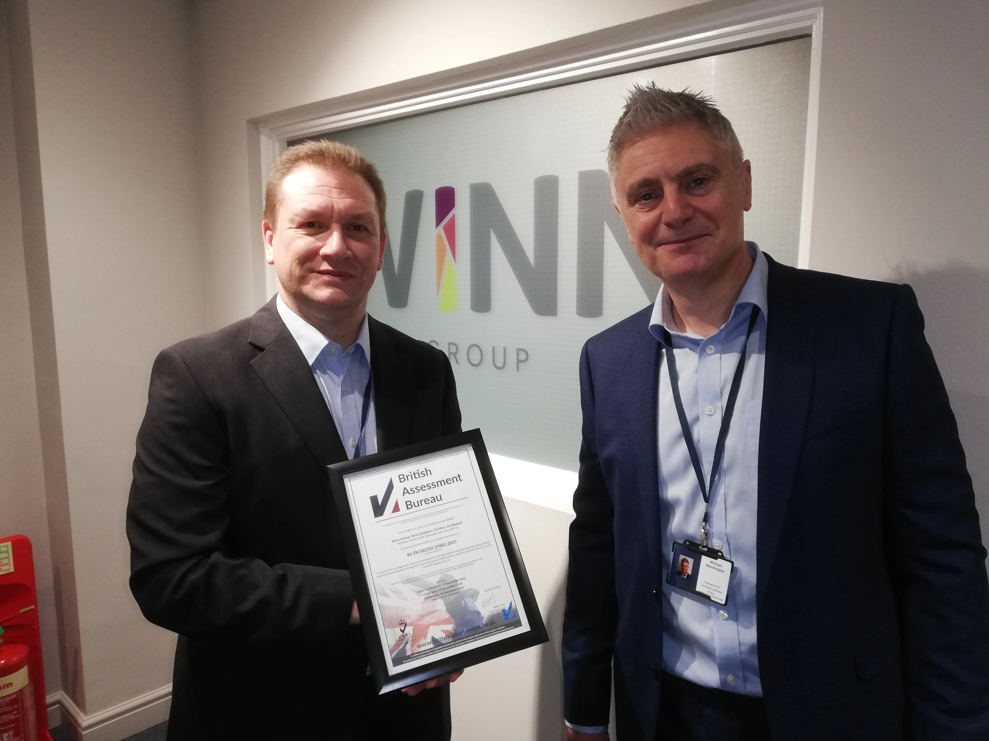 David Office, Information Security Officer, and Michael Warmington, Associate Director, with the ISO accreditation