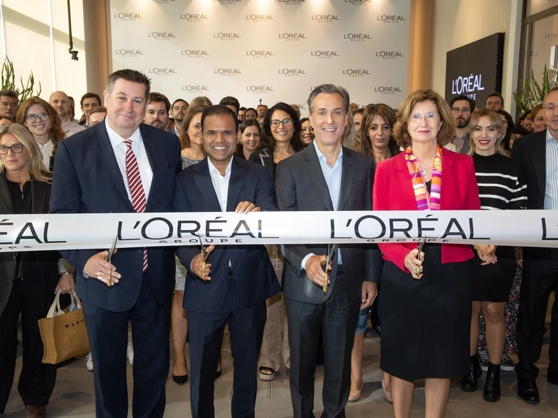 The team from L'Oréal Group cut the ribbon for their new office in London's White City.
