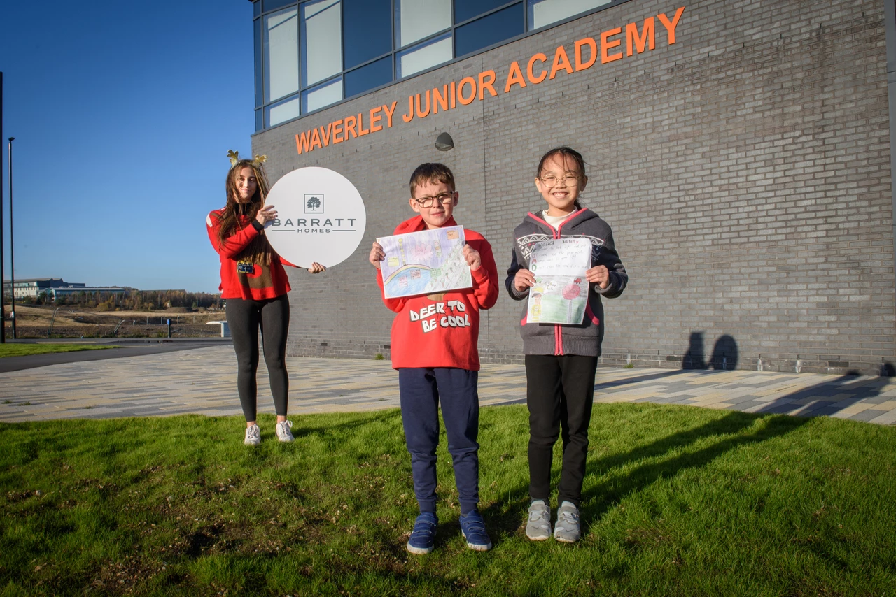 (L-R) Miss Daisy Gerrard, Year 4 class teacher with winners Ethan Liversidge, 8 and Serene Sae-Ko, 9