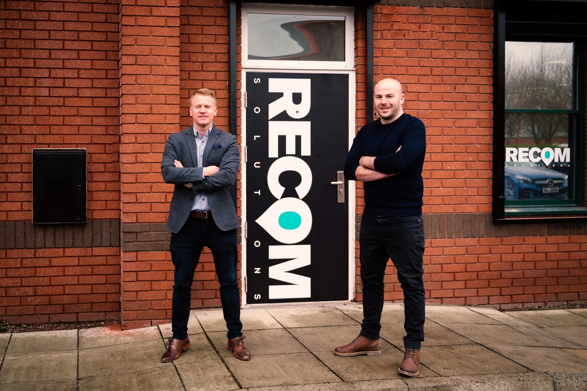 RECOM directors Jason McKnight, left, and Joseph Dillon at the company's new HQ