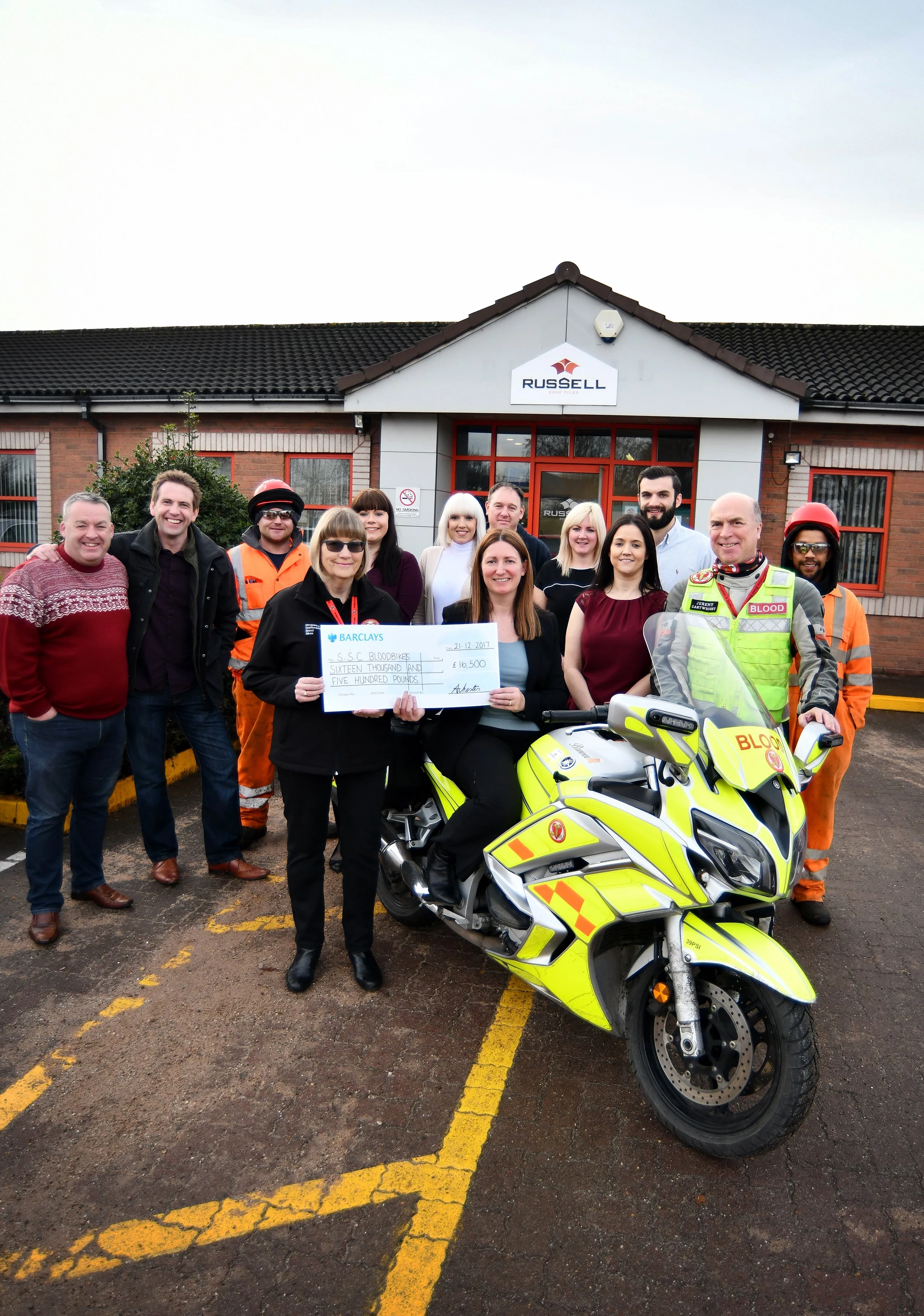 RRT team handover cheque