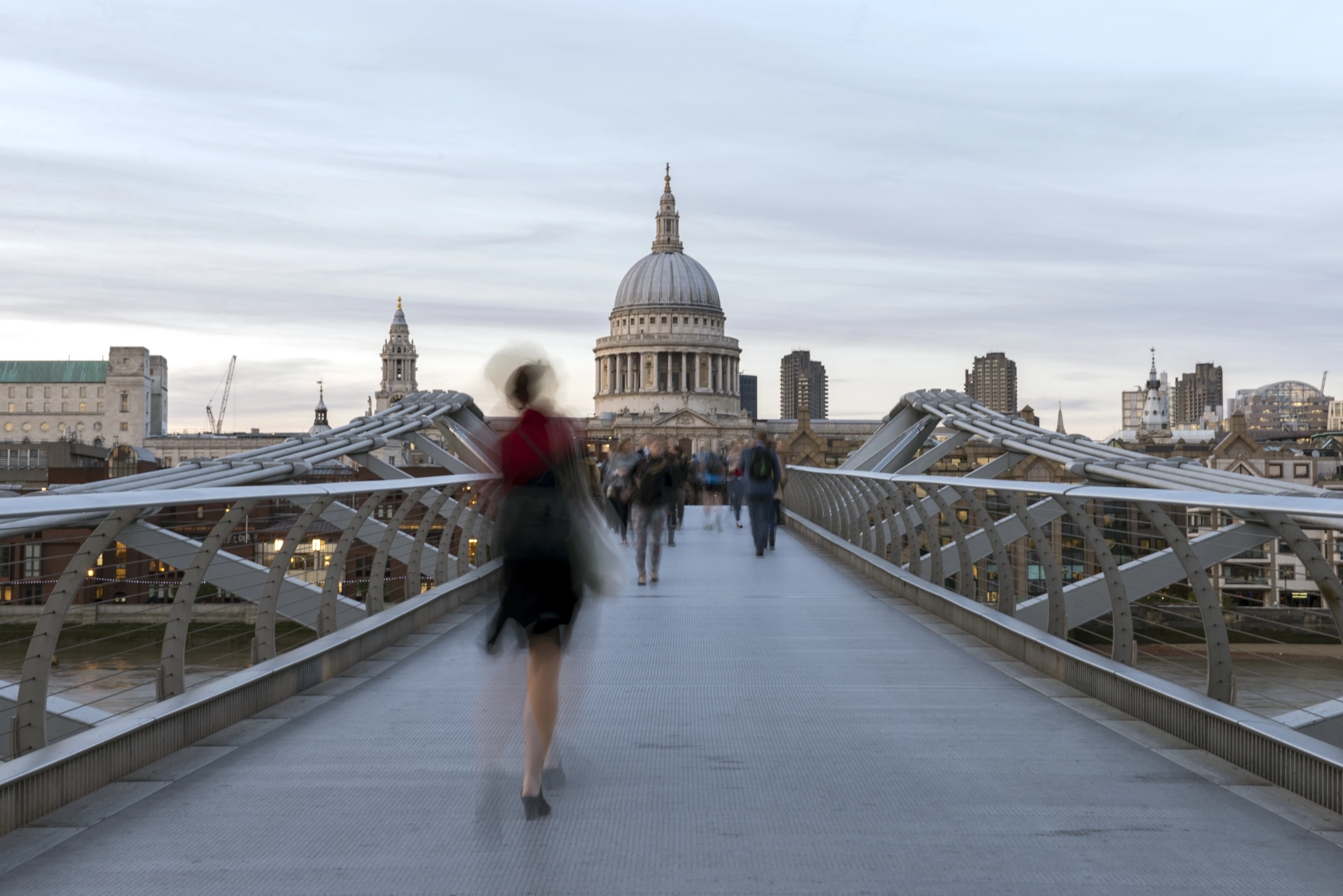 blurred woman on Millenium Bridge