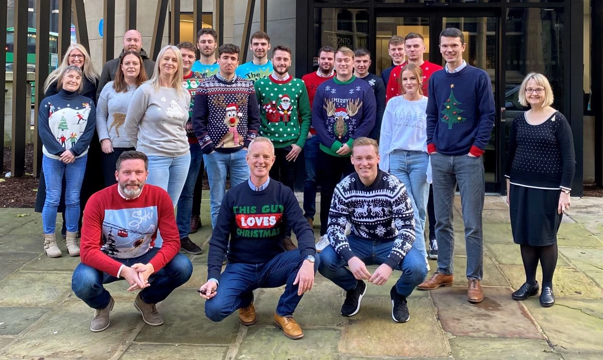 Eddisons staff are aiming to raise £1,000 for Shelter with their festive jumpers