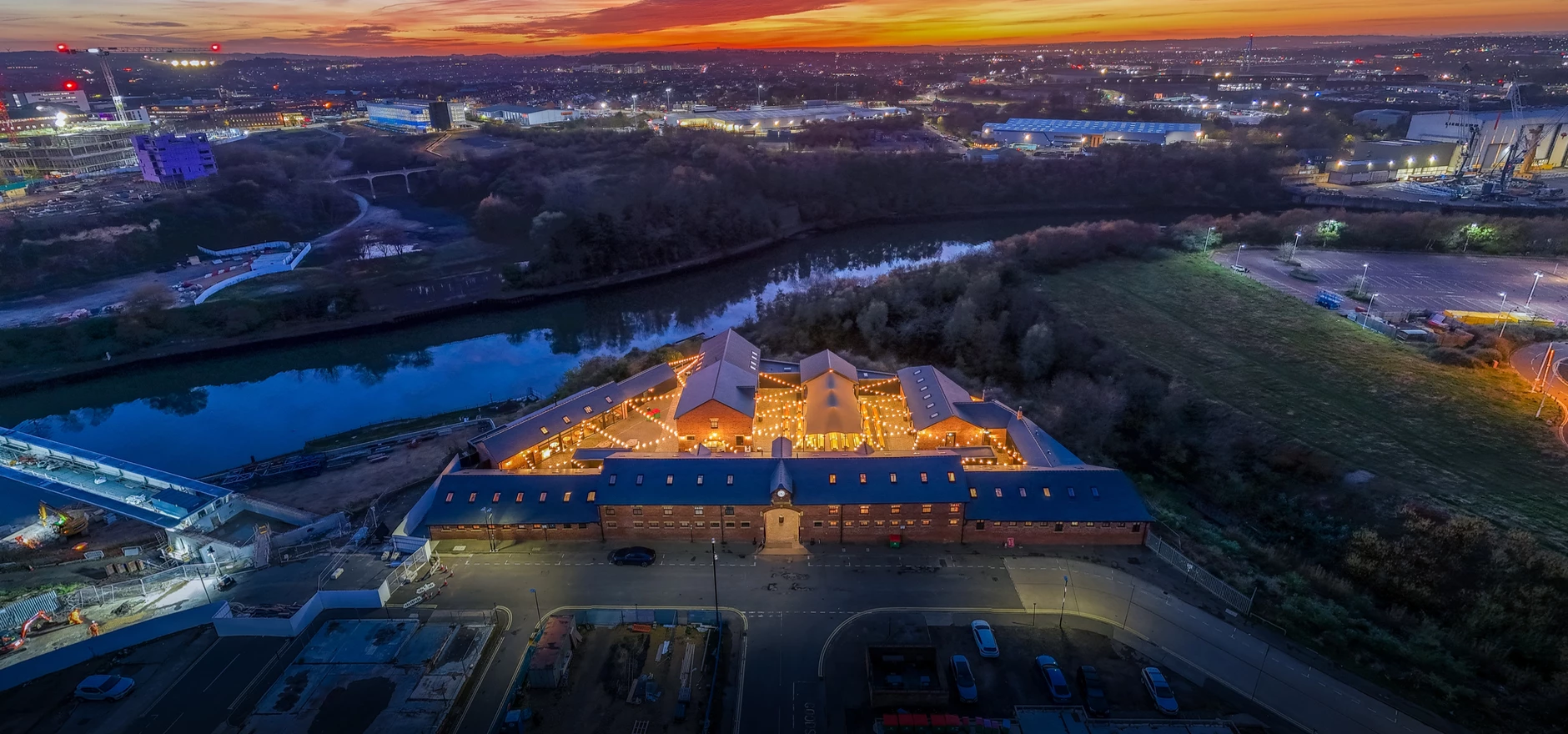 SheepfoldsStables_AerialSunsetVenue.jpg