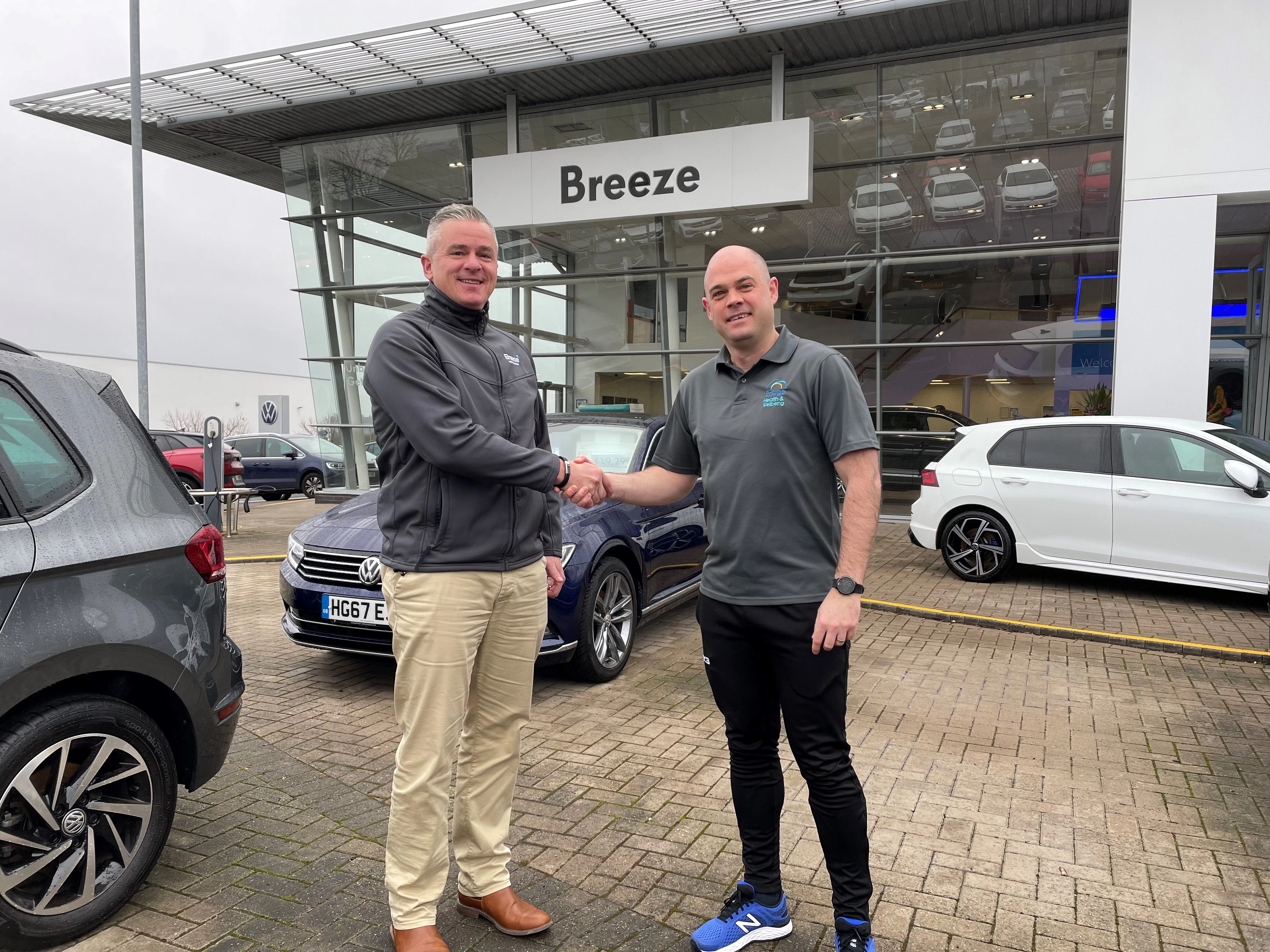 Mark Langford of Breeze Motor Group and Paul O'Connell of Bridge Health & Wellbeing