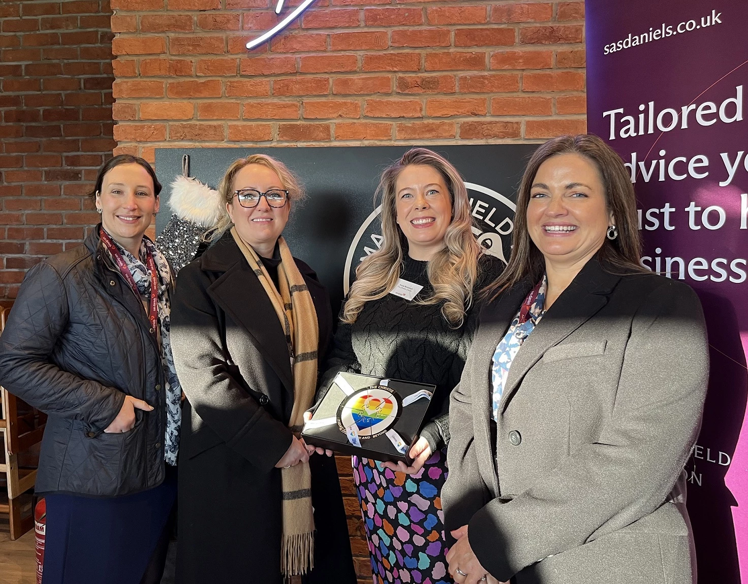 L-R: Cheryl Haywood, Senior Associate, Jo Unwin, Senior Associate and Operations Manager - Residential Conveyancing, Anna McIntosh from The Christie, and Justine Clowes, Partner and Head of the Private Client Team and the Macclesfield Office